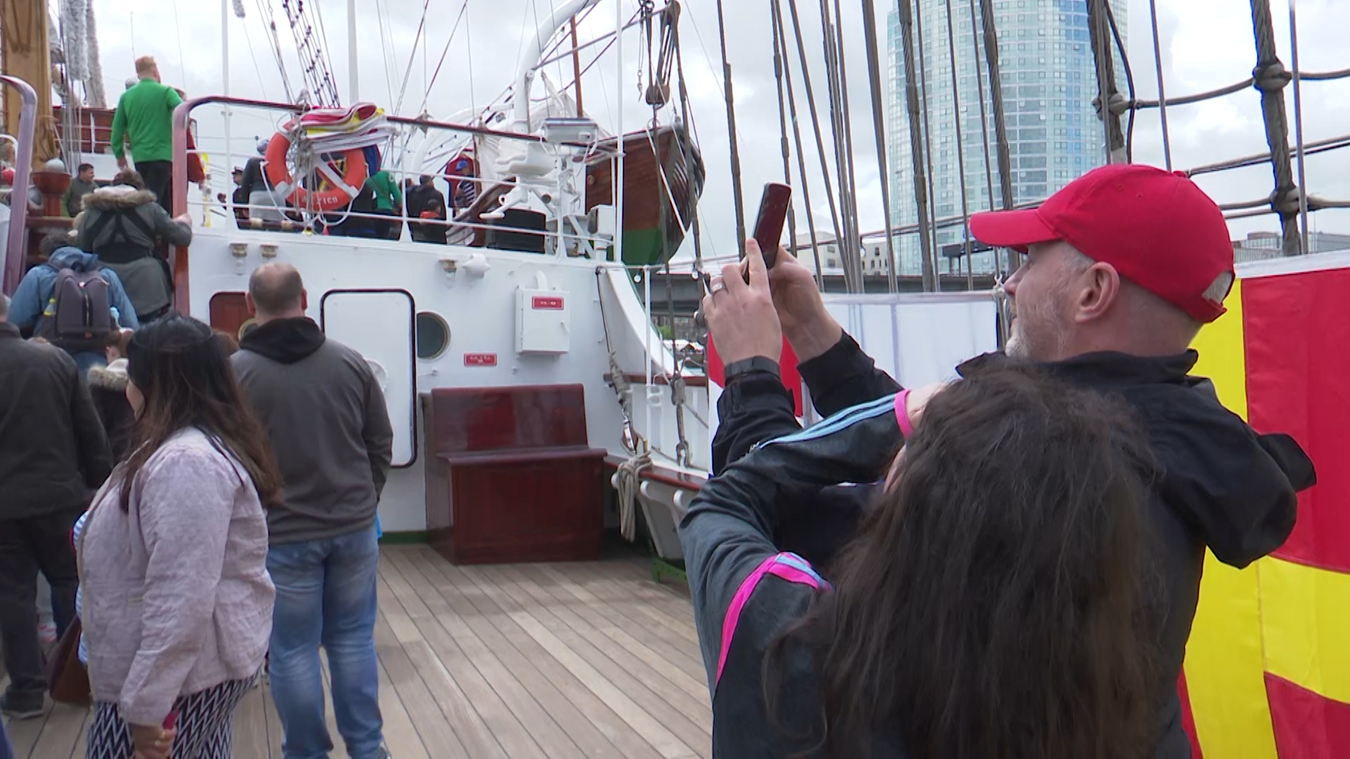 Crowds behind the scenes at Belfast Maritime Festival.