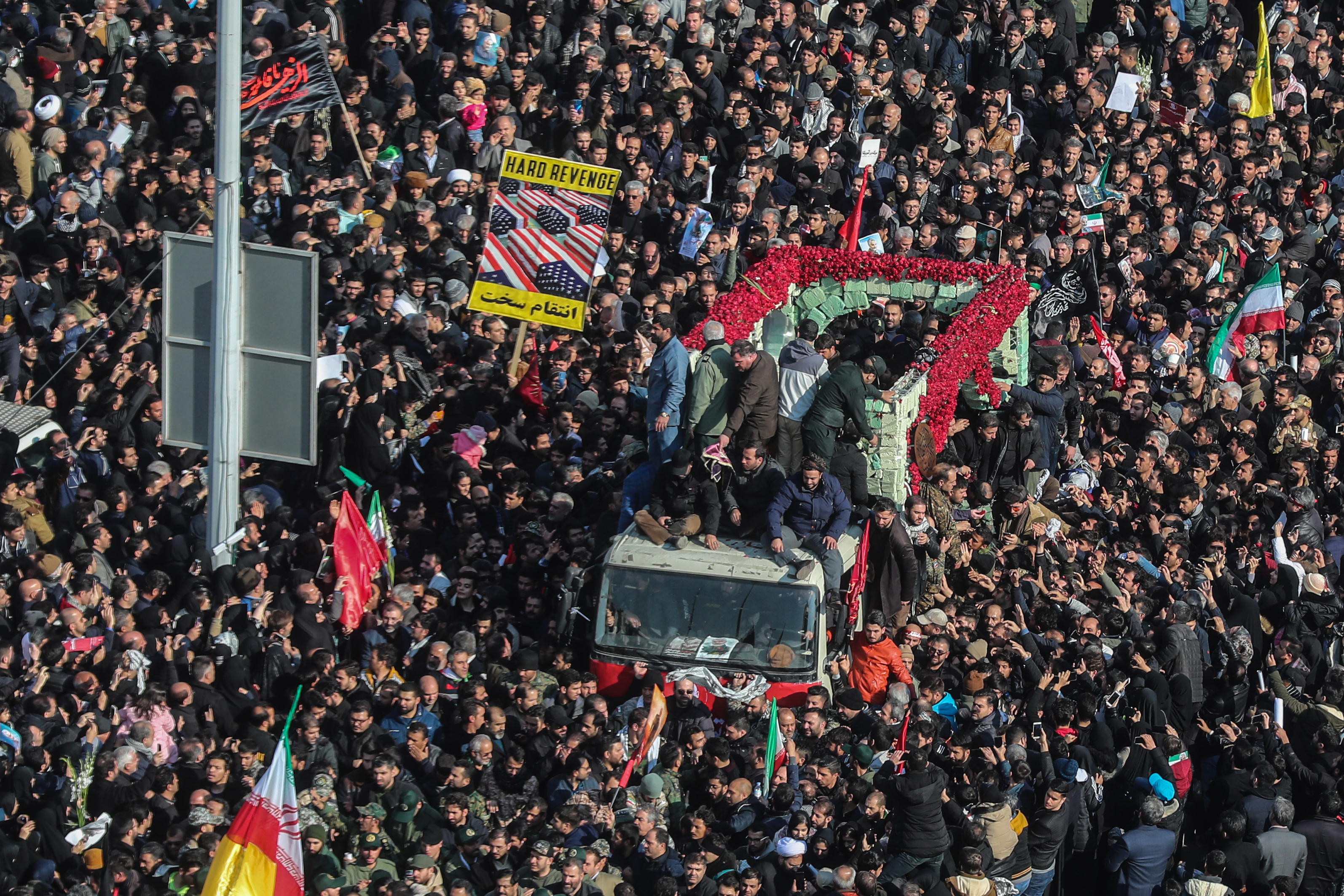 Crowds during funeral of Qassem Soleimani and Abu Mahdi al-Mohandes in Tehran (Picture: PA).