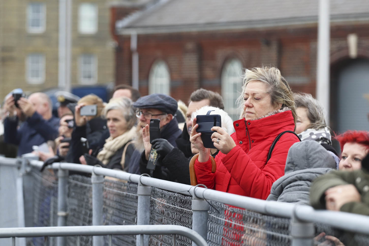 Crowds take pictures of the ship as she arrives in Portsmouth (Picture: Royal Navy).