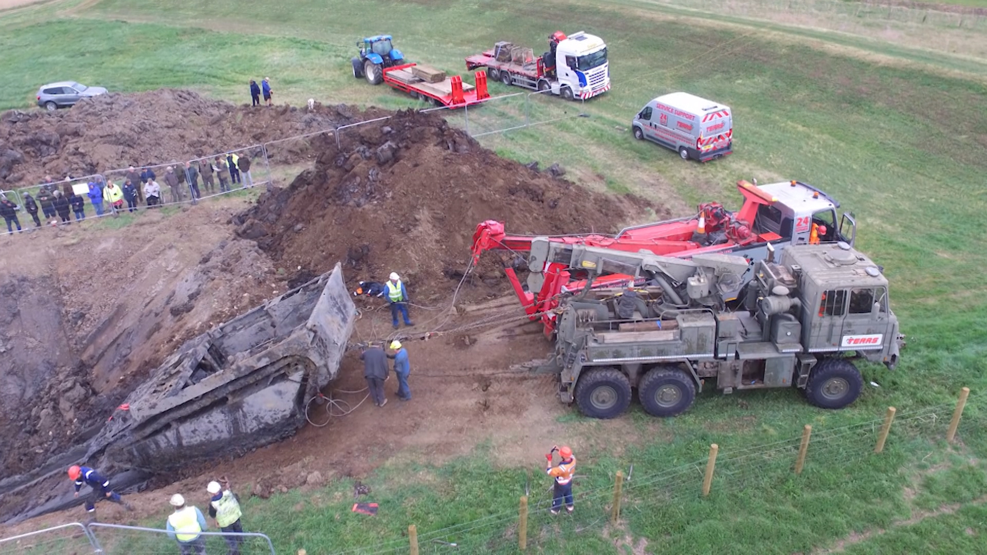  Cranes and winches assist in recovering the Buffalo