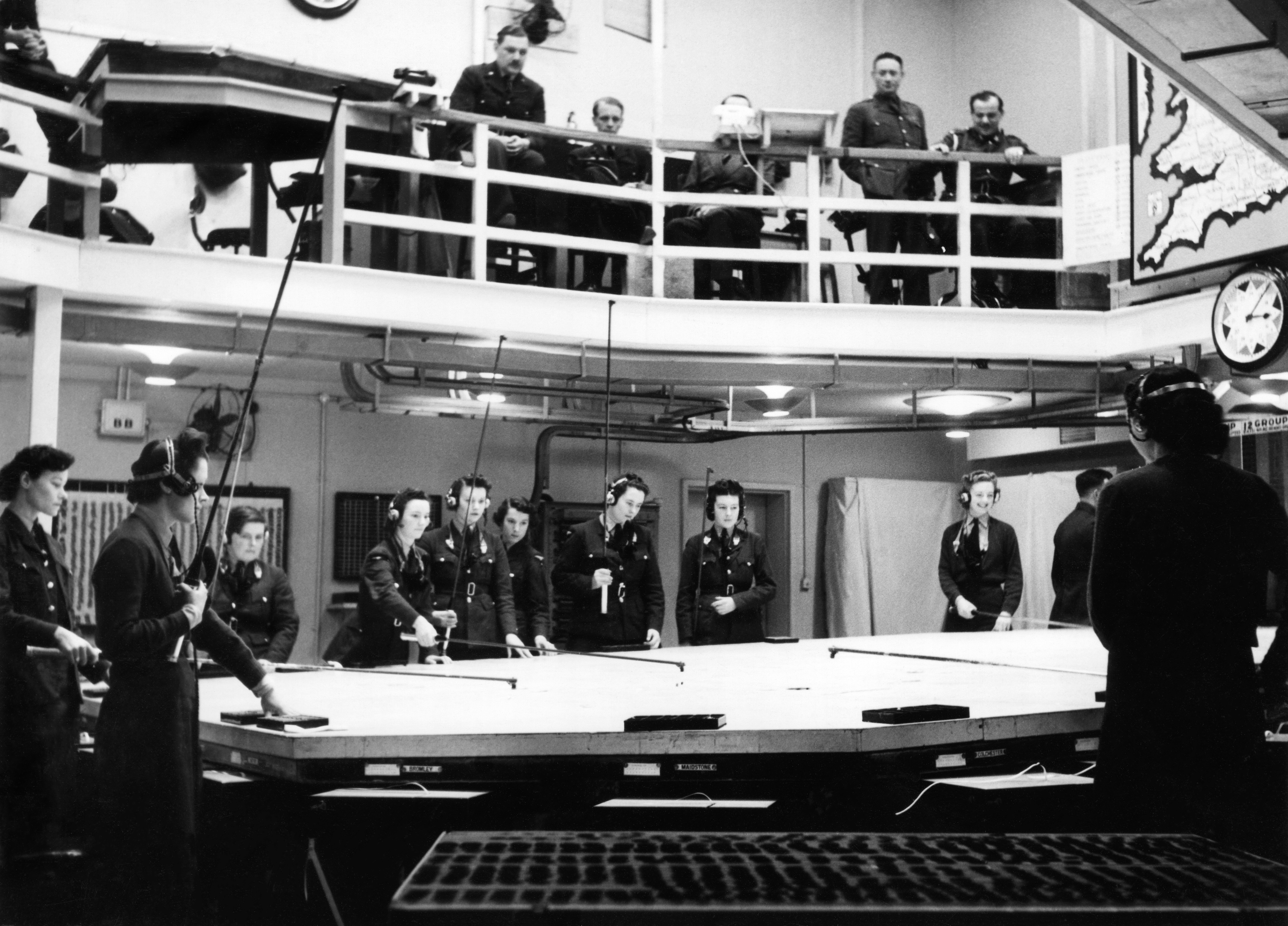 WAAF plotters pictured at work in the underground Operations Room at HQ Fighter Command