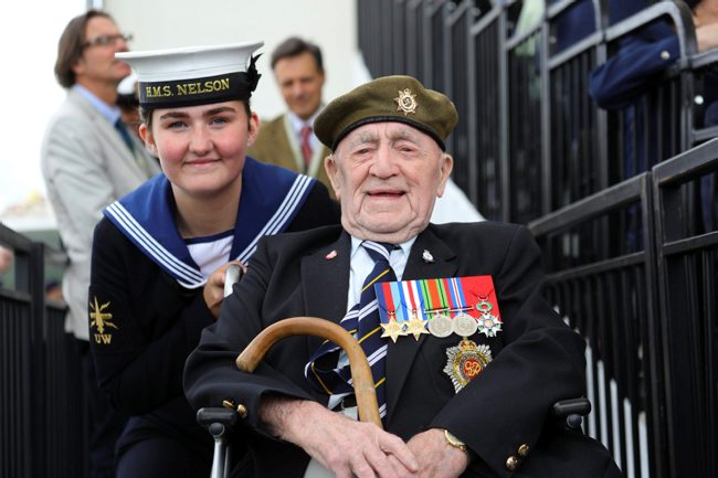 D Day veteran Henry Cullen, seen here with Bethany Thomson of HMS Nelson, at an international D-Day event on Southsea Common 050619 CREDIT MOD.jpg