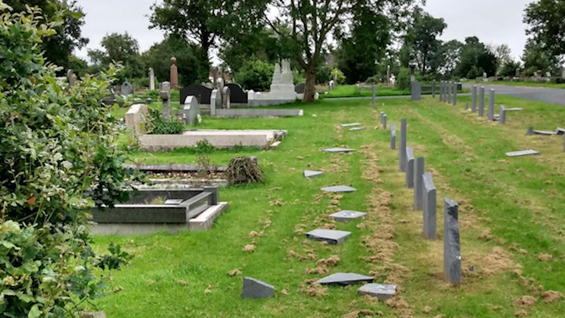 Damage to war grave headstones at Belfast City Cemetery (Picture: CWGC).