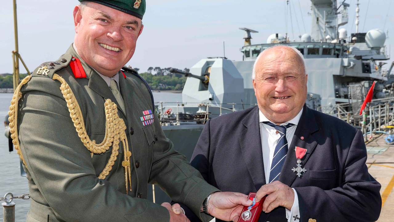 Dave Trigger, pictured with Brigadier Mike Tanner, was presented with the Imperial Service Medal after 52 years of service to the Royal Navy in the Civil Service (Picture: Royal Navy).