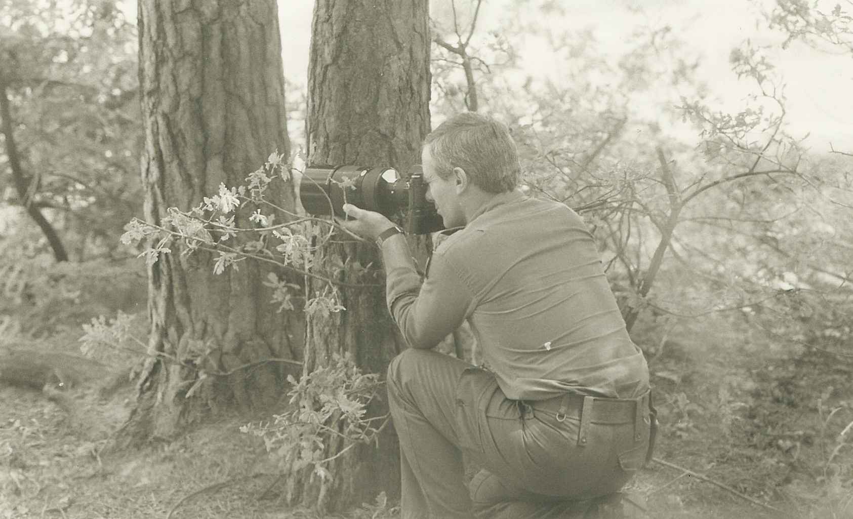 David Butler BEM using a long lens camera during BRIXMIS operation CREDIT BRIXMIS Association.jpg 