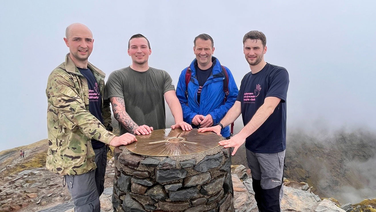David Lynham, Ben Crowley, David's father and friends pictured at the top of Snowdon in Wales CREDIT David Lynham