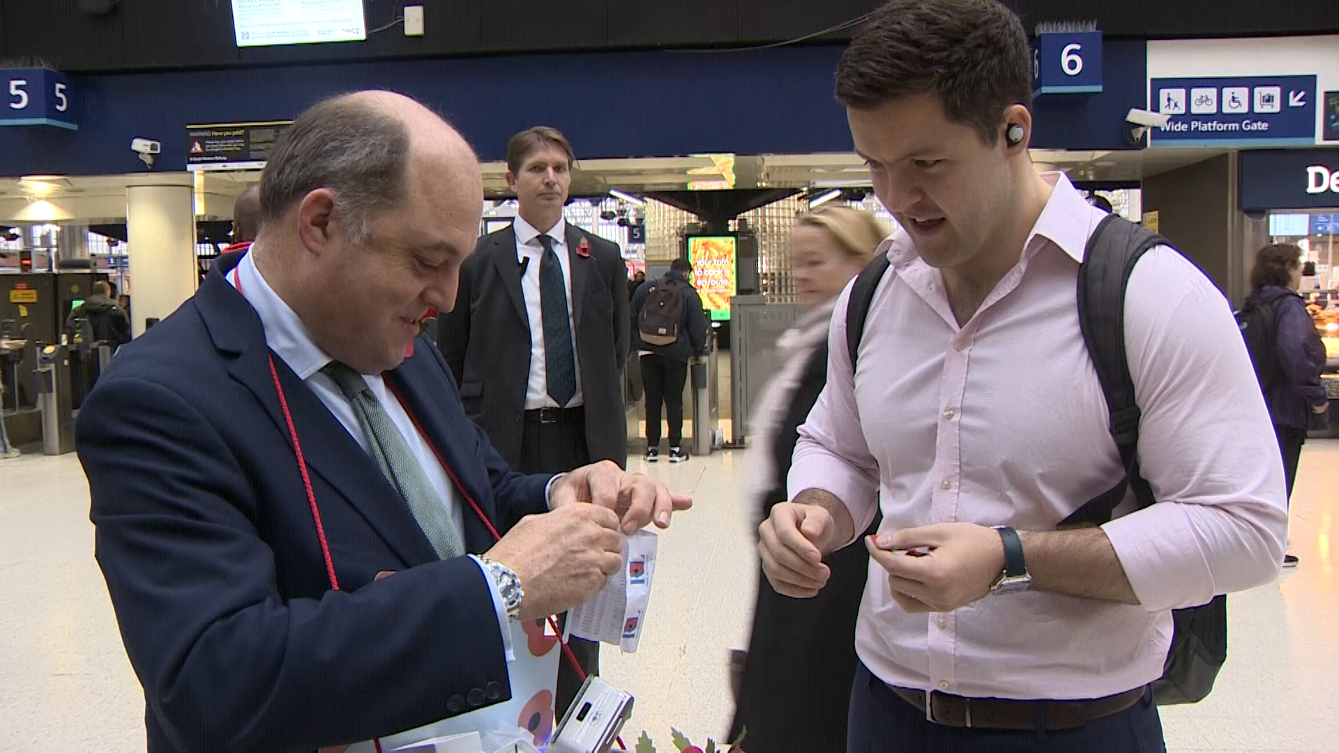 Defence Secretary Ben Wallace at Paddington selling poppies on London Poppy Day 031122 CREDIT BFBS.jpg