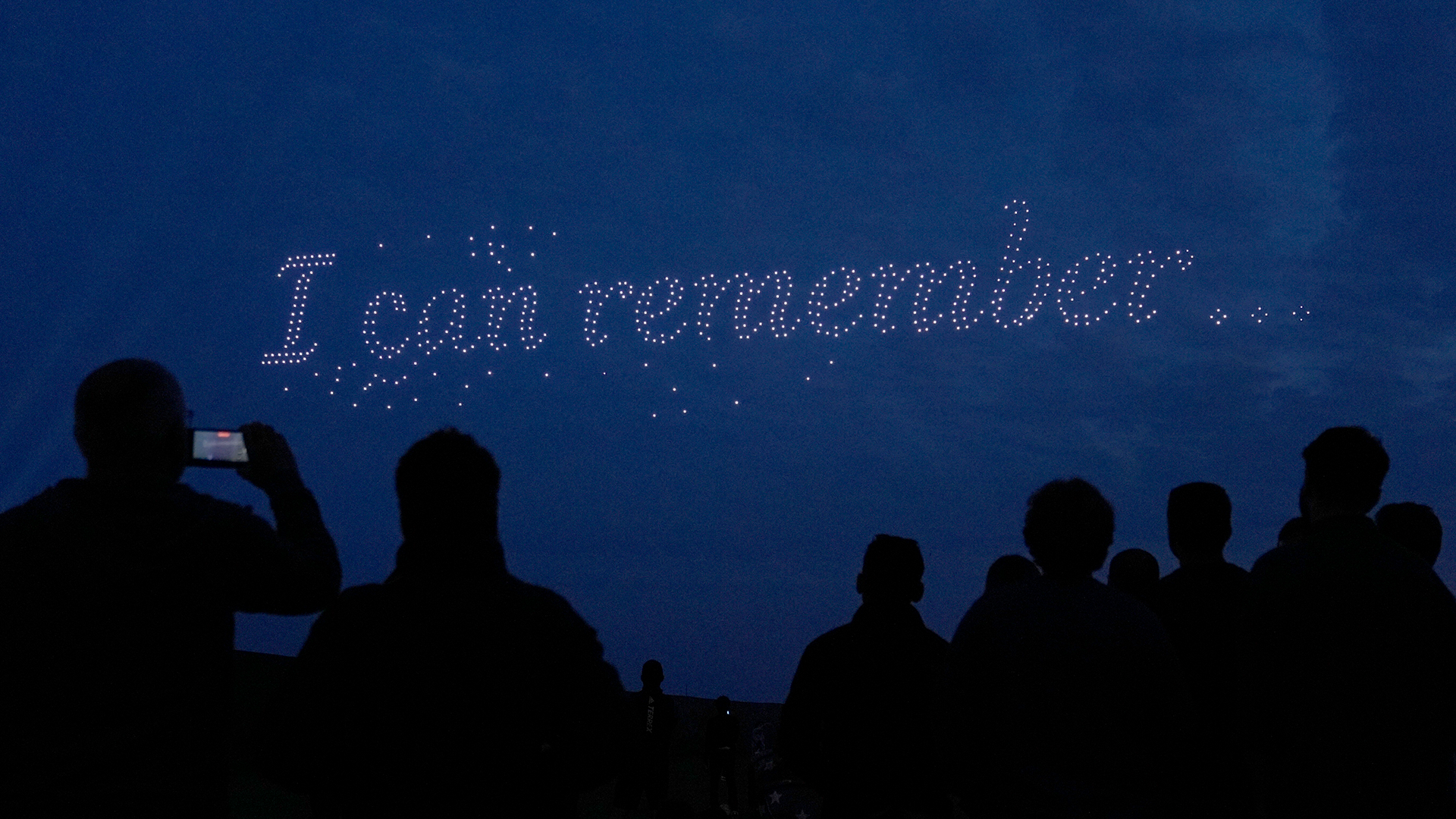 Drones make a bird shape during a drone display telling the story of D-Day above the coastline in Portsmouth 060624
