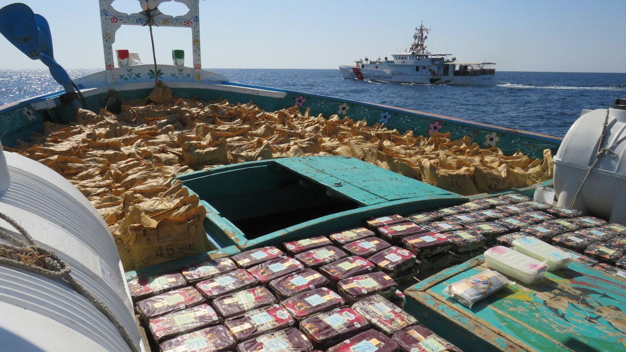 Drugs on the deck of a dhow with United States Coast Guard cutter Emlen Tunnel standing guard (Picture: Royal Navy).