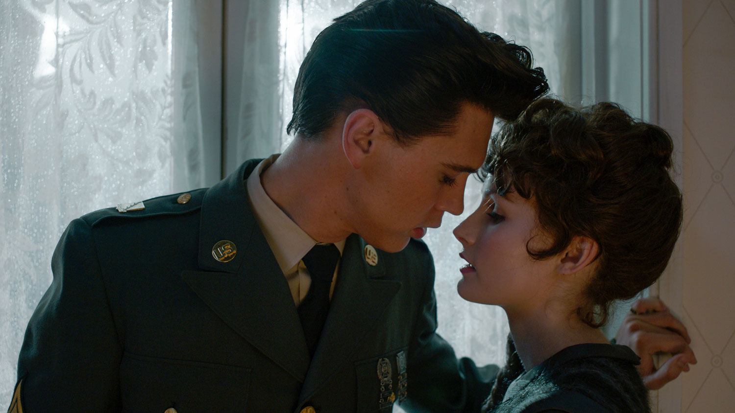 Cover image: Austin Butler as Elvis Presley and Olivia DeJonge as Priscilla Presley in Warner Bros. Pictures' drama 'Elvis' (Picture: Courtesy of Warner Bros. Pictures).