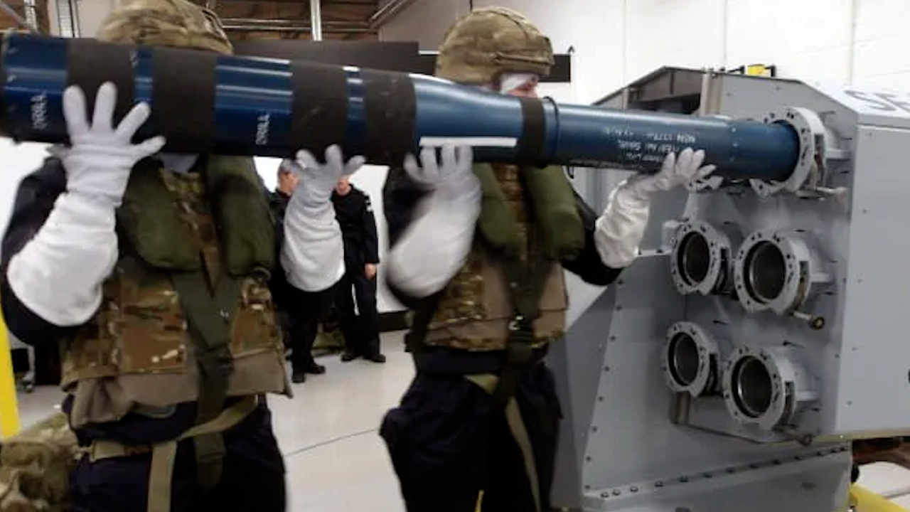 Electronic Warfare specialists practise loading and reloading the new decoy launcher which will boost the capabilities of the Royal Navy (Picture: Royal Navy)