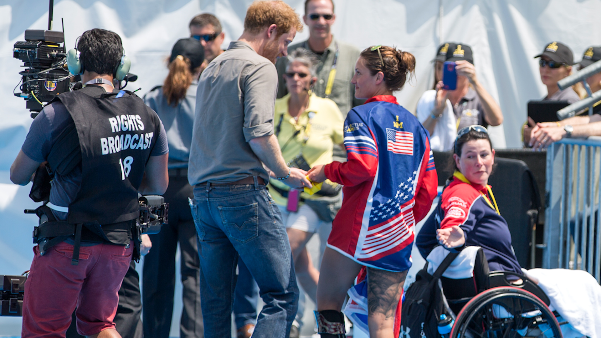 Elizabeth Marks, US gives Prince Harry her medal after the medal ceremony during the 2016 Invictus Games