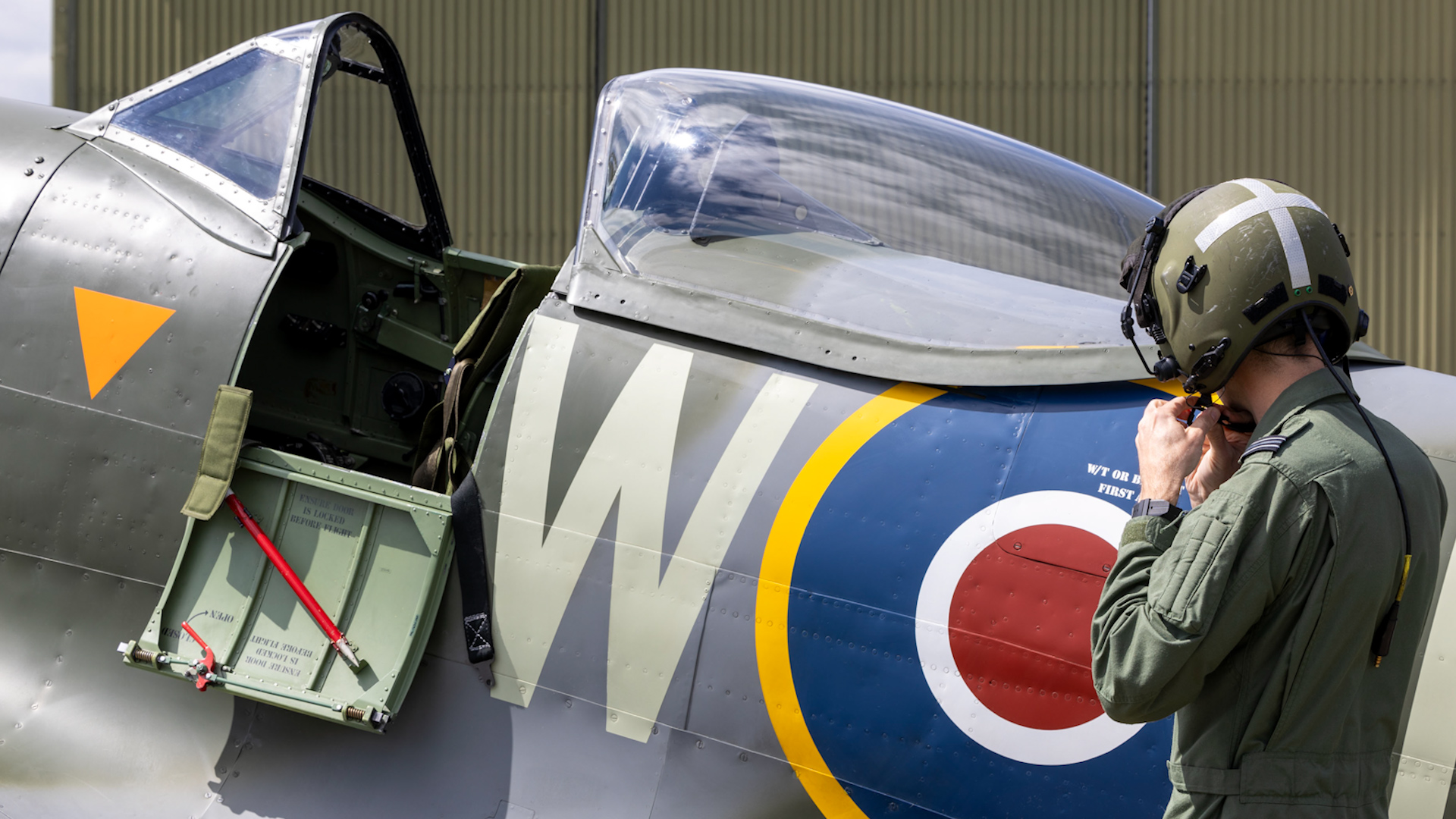 Engineers and Pilots from the Battle of Britain Memorial Flight prepare Spitfire