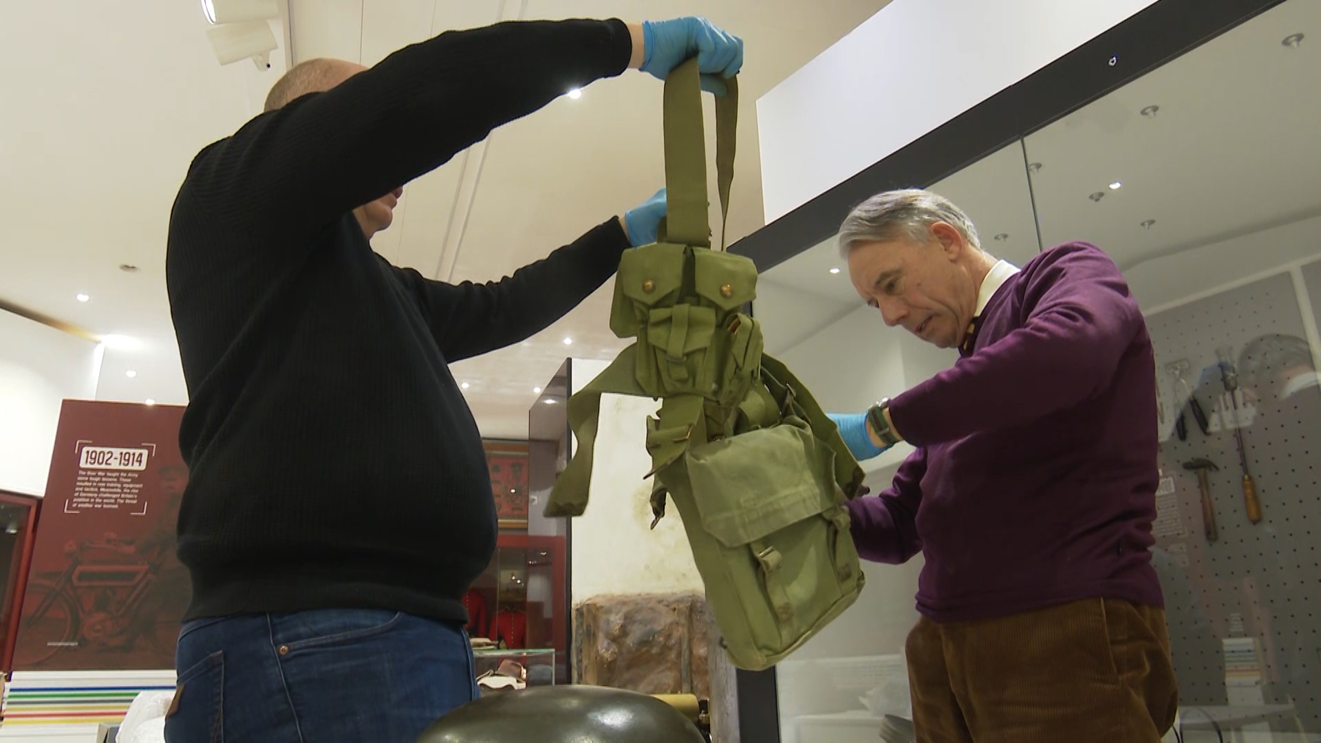 Examining one of the items found during a stock take at York Army museum.