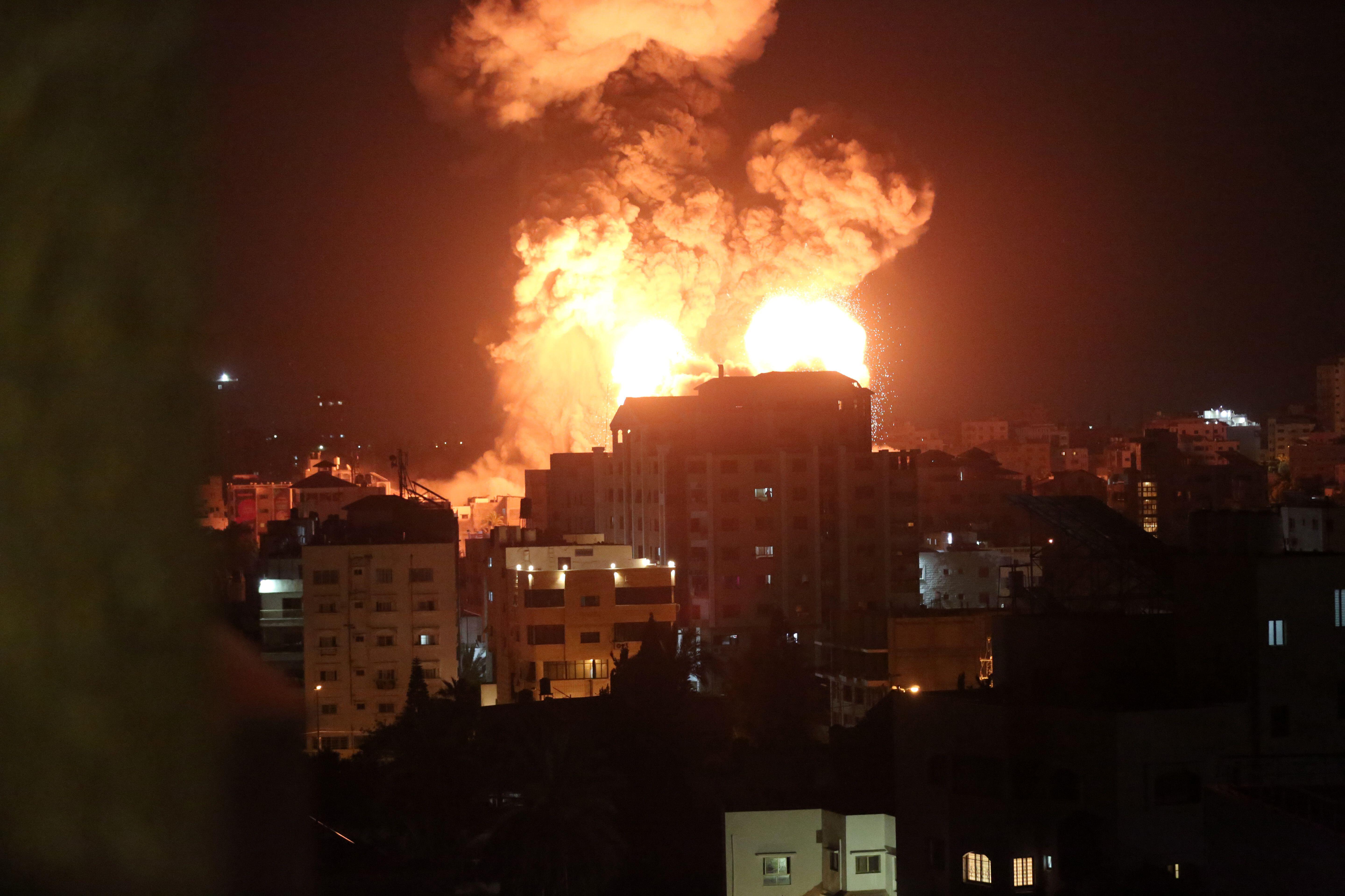 Explosions following Israeli air strikes in Gaza city amid days of fighting (Picture: Alamy).