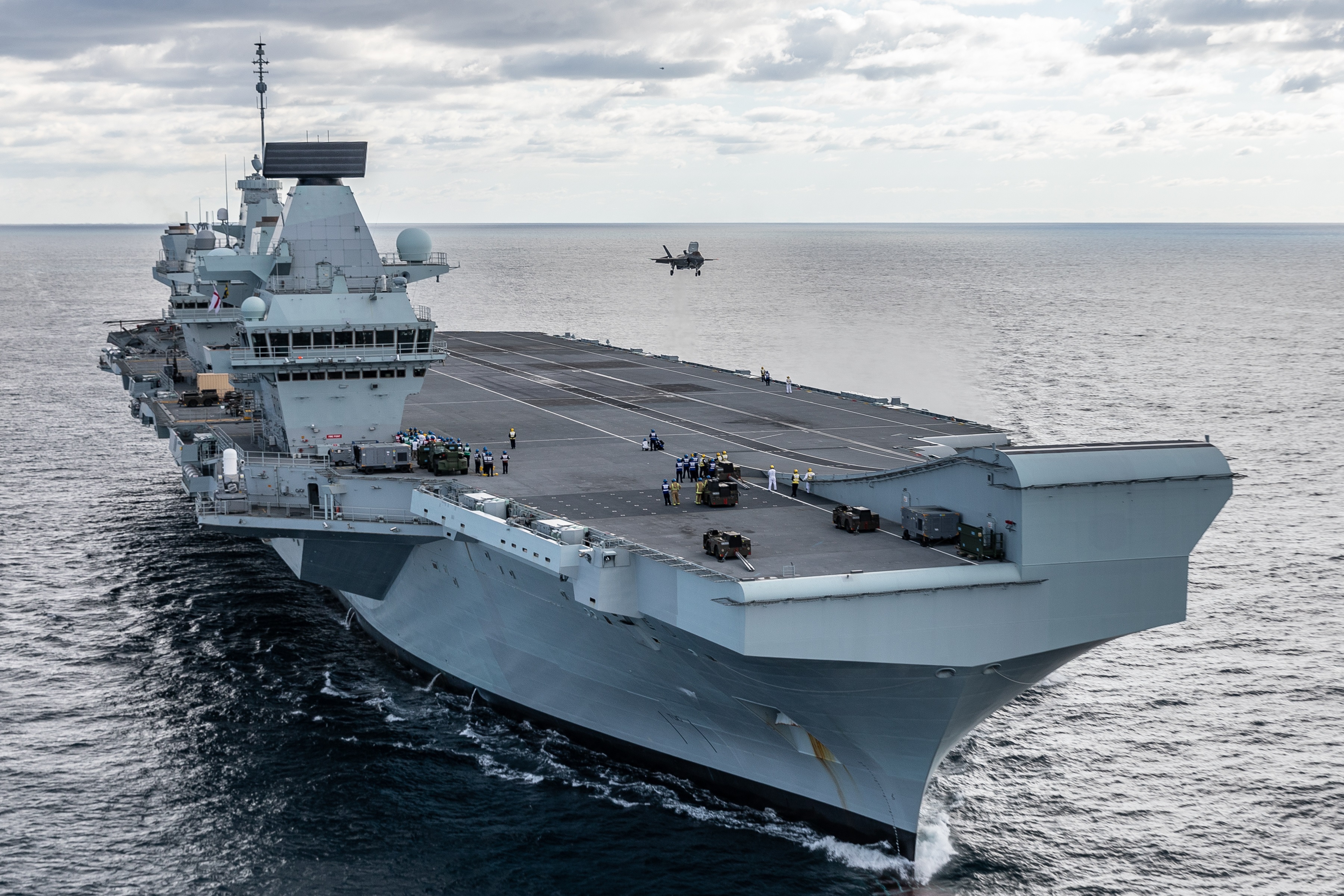 F-35 above HMS Queen Elizabeth 131019 CREDIT MOD.jpg