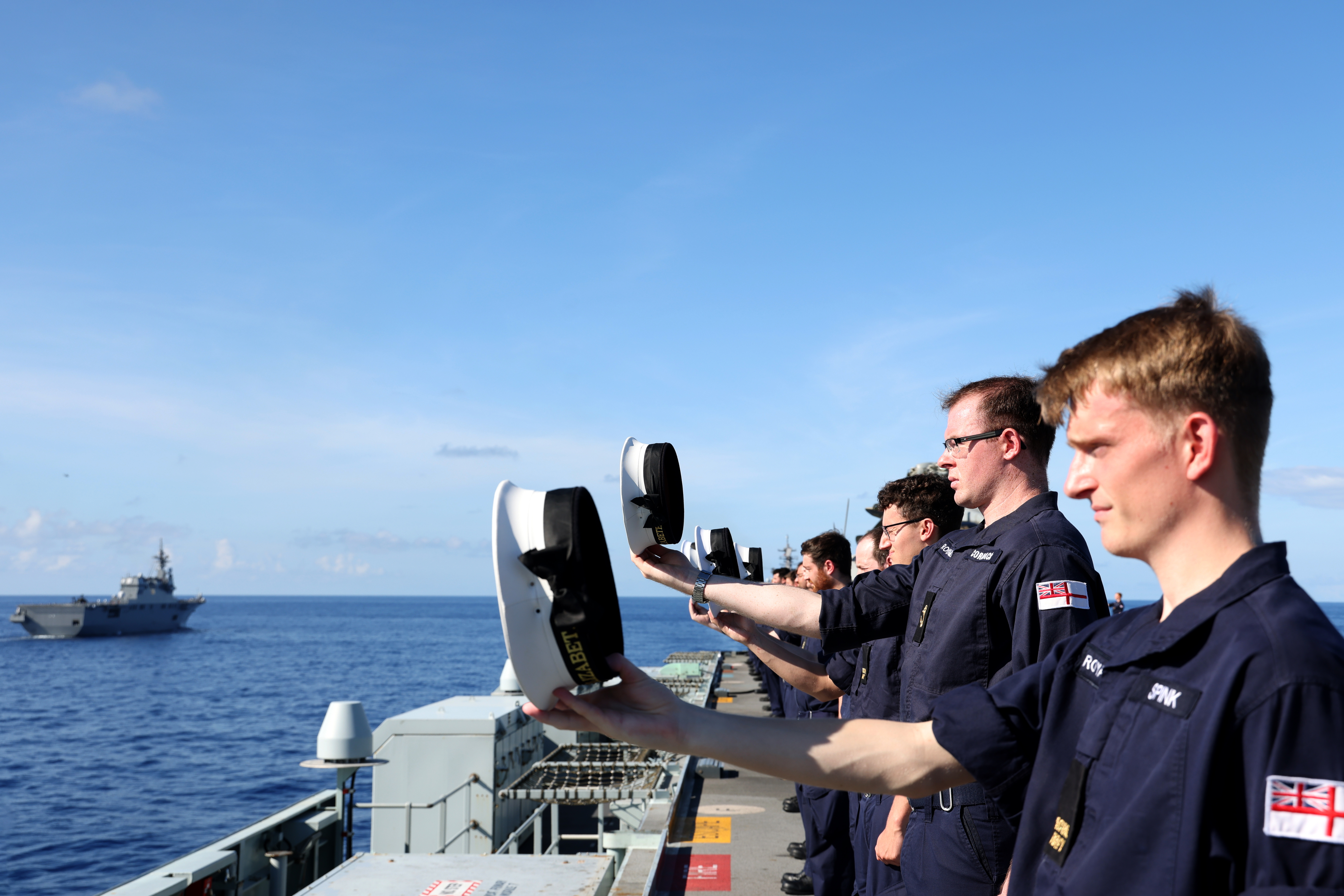 A ceremonial 'Cheer Ship' from the upper deck of HMS Queen Elizabeth.