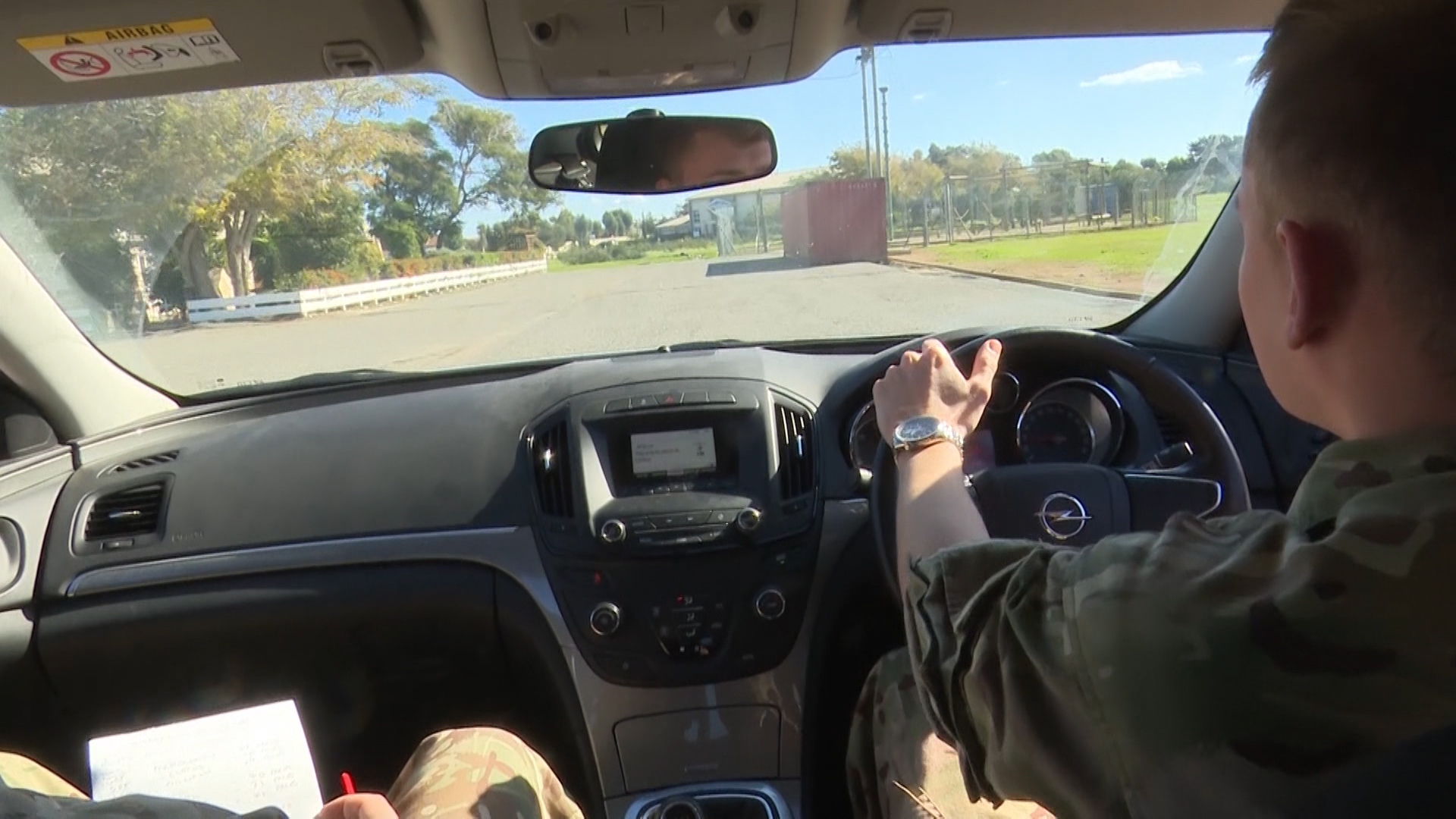 Driver and instructor perform Cyprus road safety test