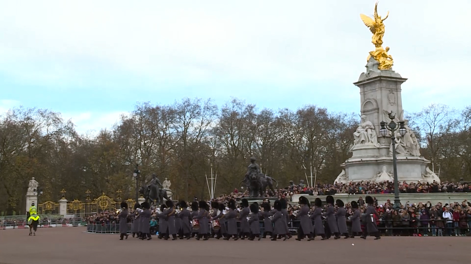 Coldstream Guards march past Buckingham Palace