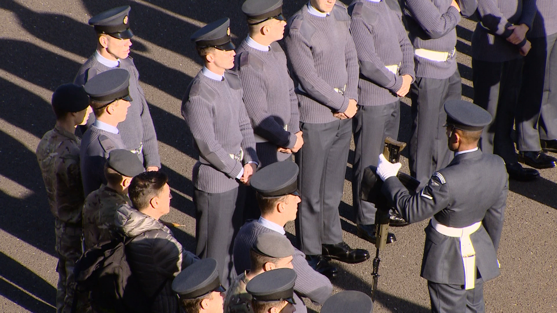 RAF recruit performs rifle drill for Queen's Colour Squadron