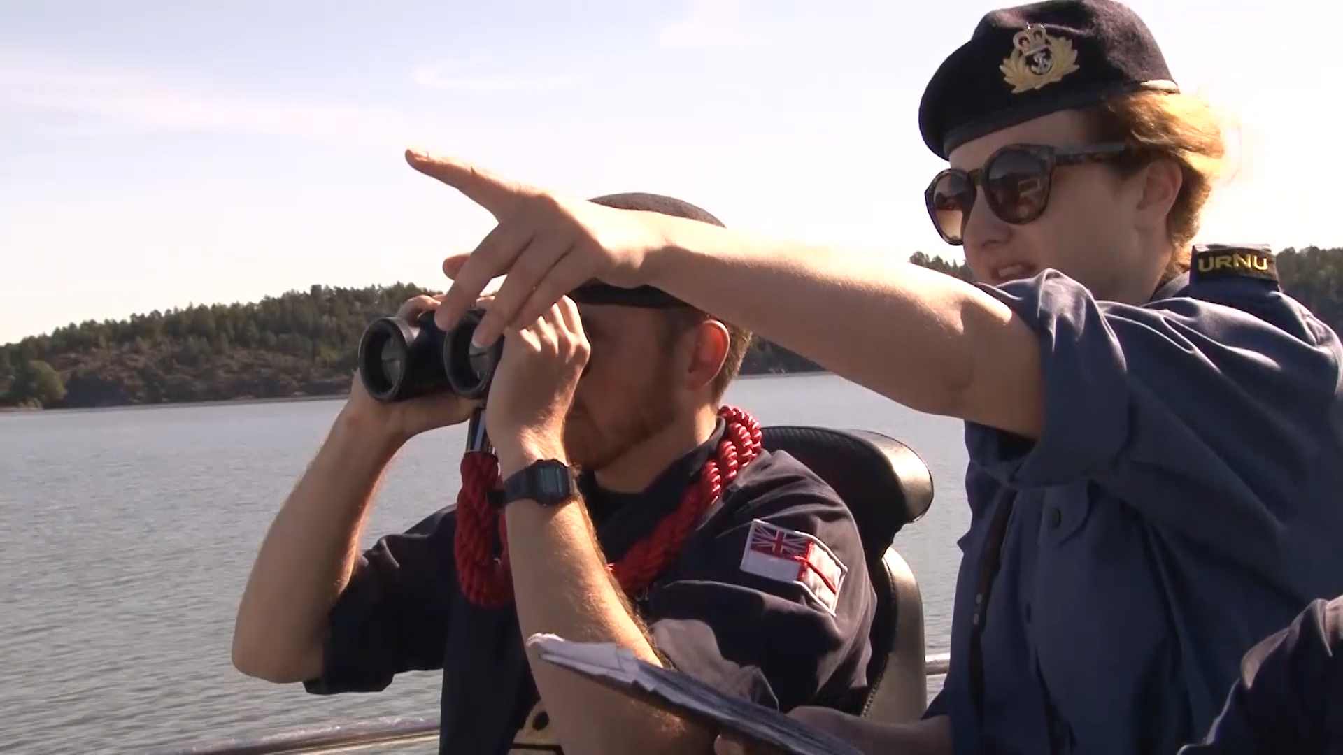 Crew of Royal Navy P2000 patrol boat navigate Sweden's Gota Canal