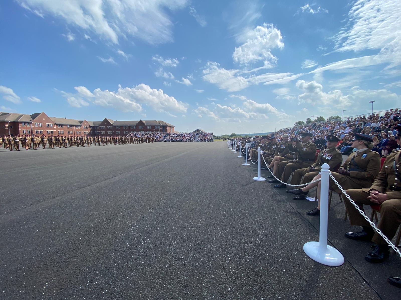 Family and friends watching the passing out parade of Junior Soldiers graduating from Army Foundation College Harrogate, the first time loved ones have been able to attend since 2019 