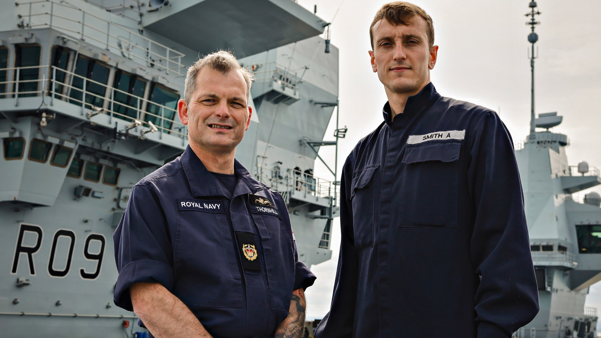 Father and son duo Engineering Technician Ashley Smith and his dad Warrant Officer 2 Duncan Thornhill on HMS Prince of Wales 170521 CREDIT ROYAL NAVY