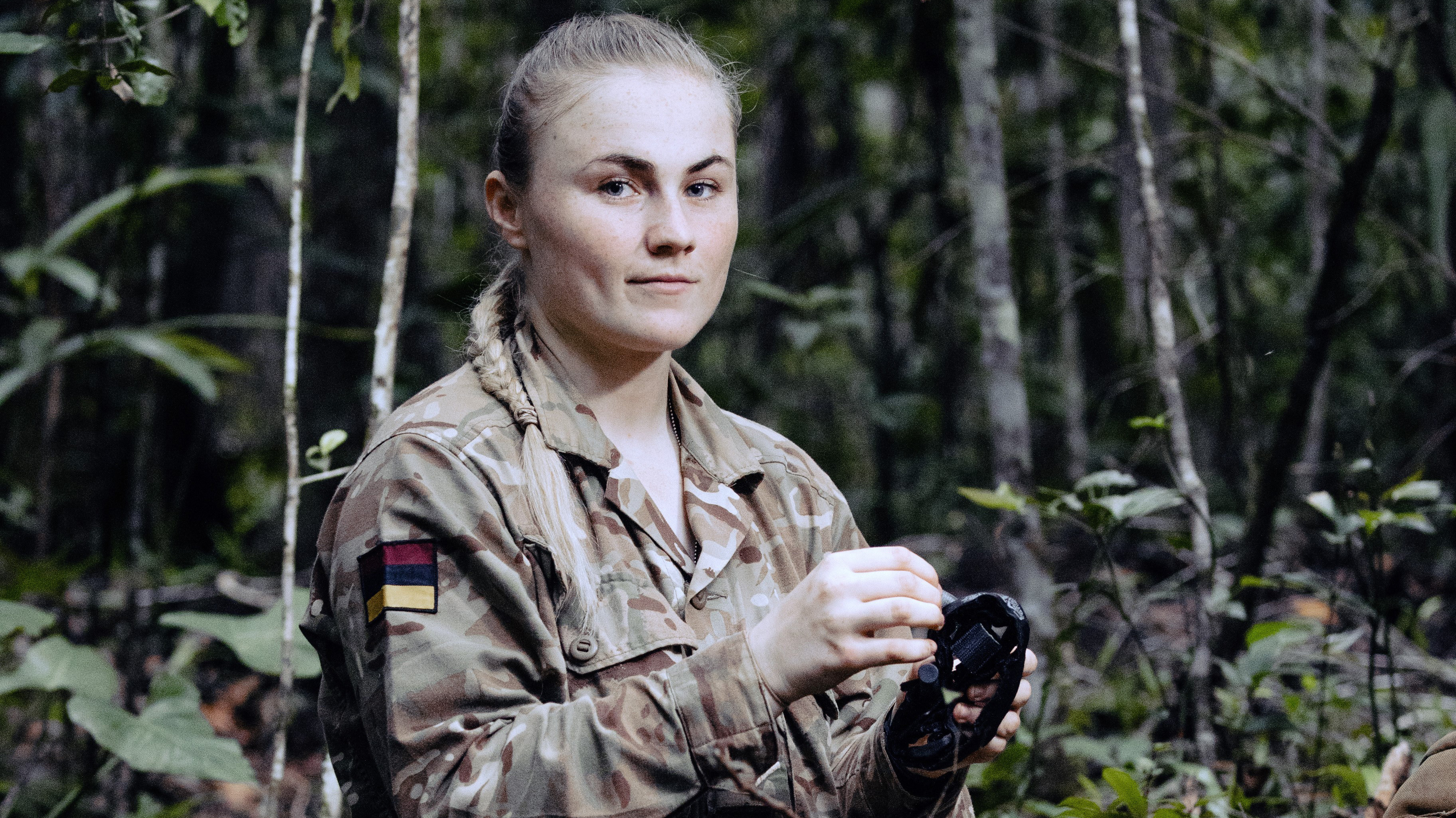Female Combat Medical Technician, checks tourniquet in her medic bag on Exercise Mayan Storm in Belize