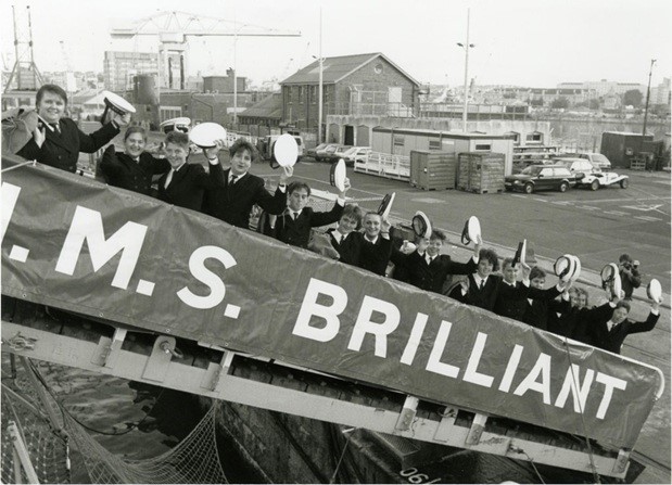 The first female personnel to serve at sea on the gangway of HMS Brilliant in 1990 early in the morning Picture: Pippa Gregory).