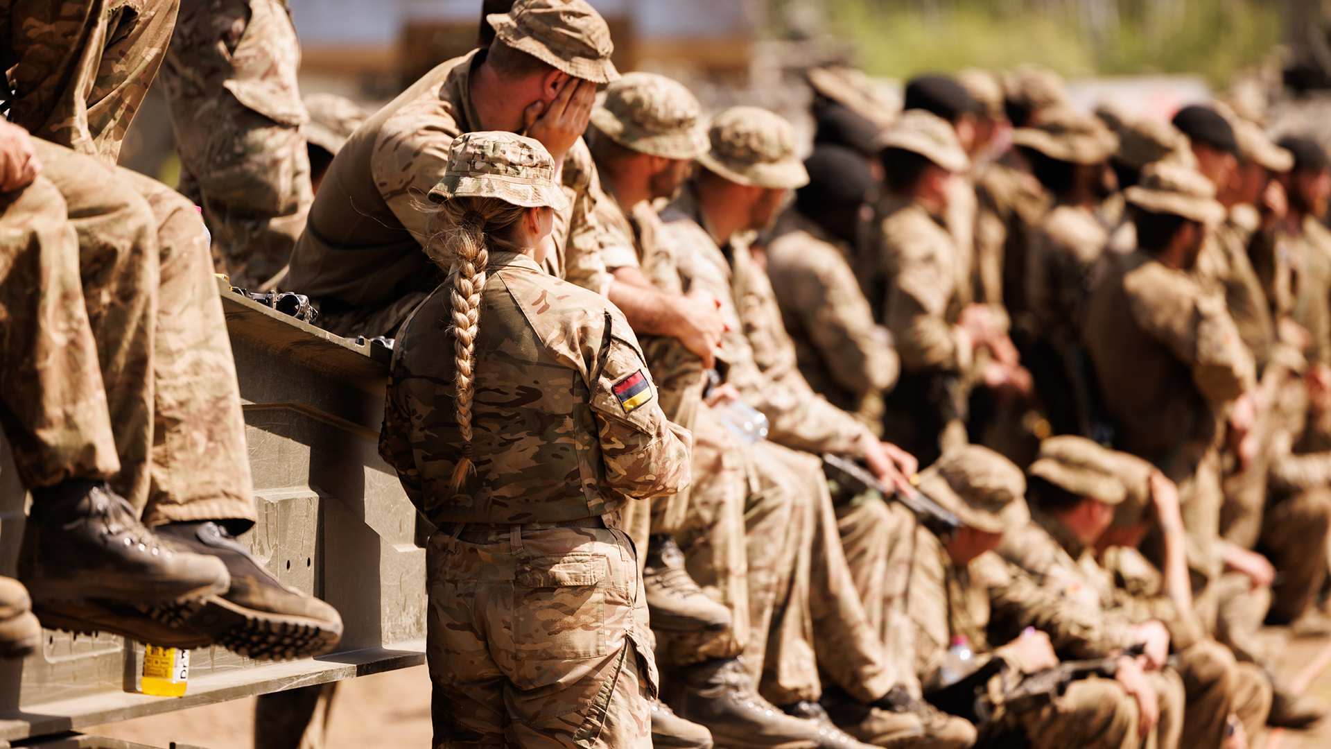 Female soldiers from 1st Battalion The Royal Welsh sit on deployable bridging during a drill on the Drawsko Pomorskie Training Area in Poland on Ex Steadfast Defender 090125 CREDIT MOD