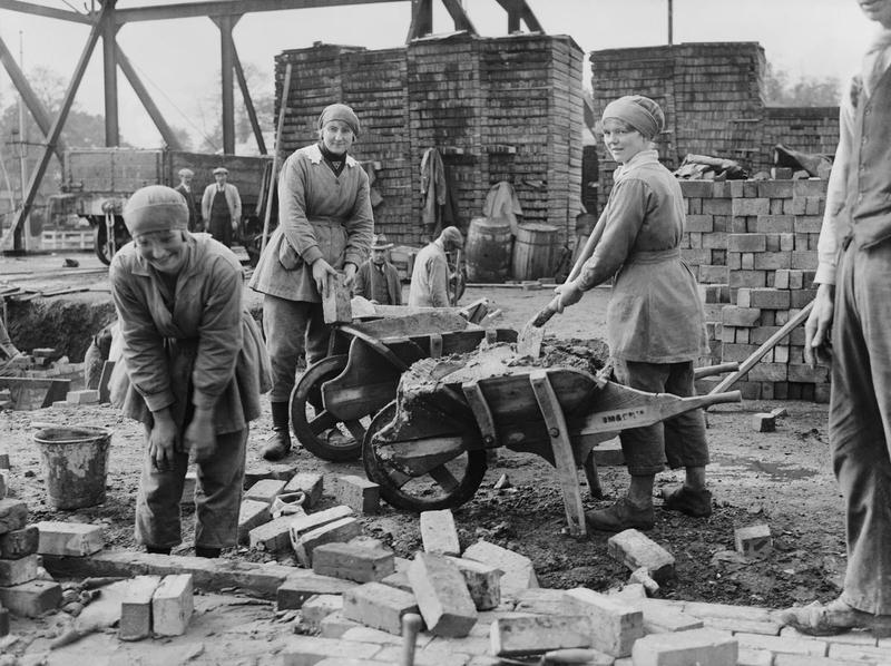 Female bricklayers on building site during WWI