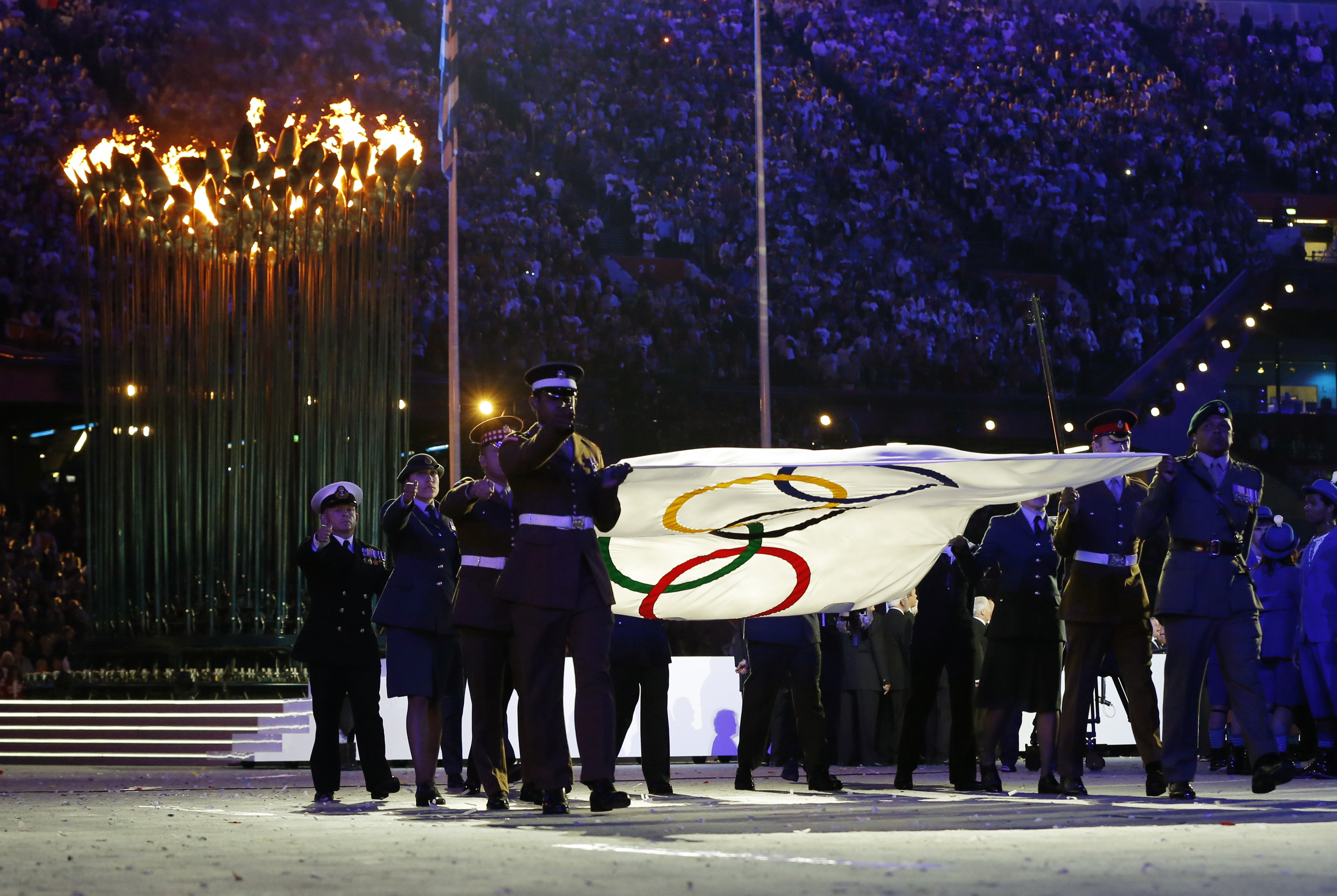 Scotty holding 2012 Olympic Flag