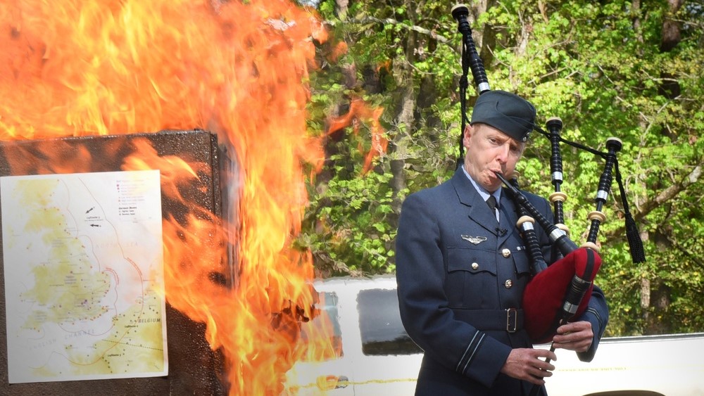 Flight Lt. Leigh Johnson, RAF exchange officer, plays bagpipes during a piano burning at Robins Air Force Base 06042018 Credit US Dept of Defense.jpg
