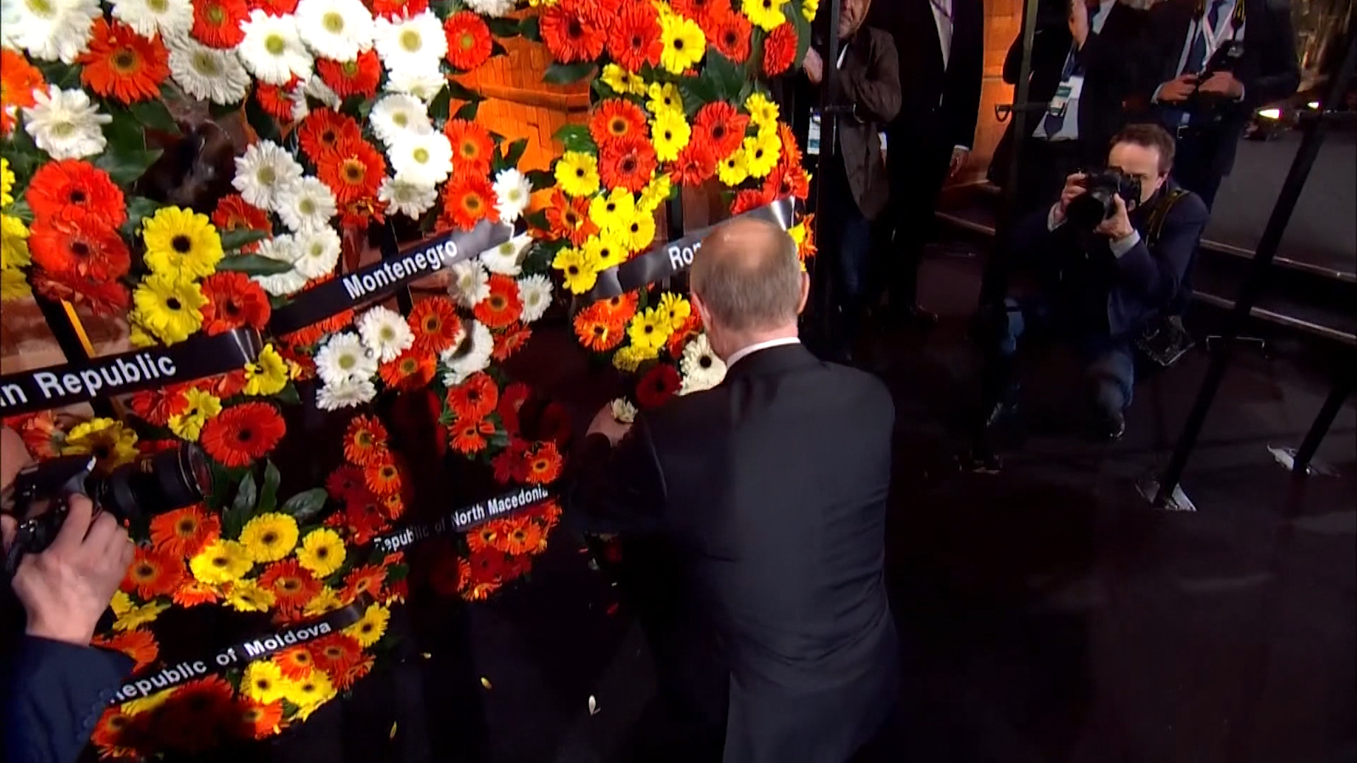 Flower crowns remembrance Holocaust Forum 2020 230120 CREDIT REUTERS.jpg