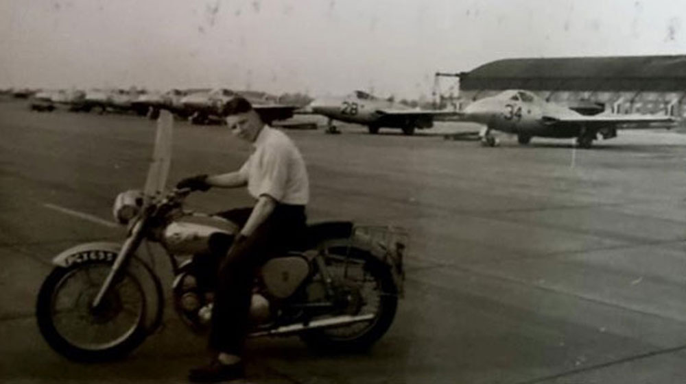 Flt Lt Alan Pollock on a motorbike during his RAF service CREDIT Flt Lt Alan Pollock