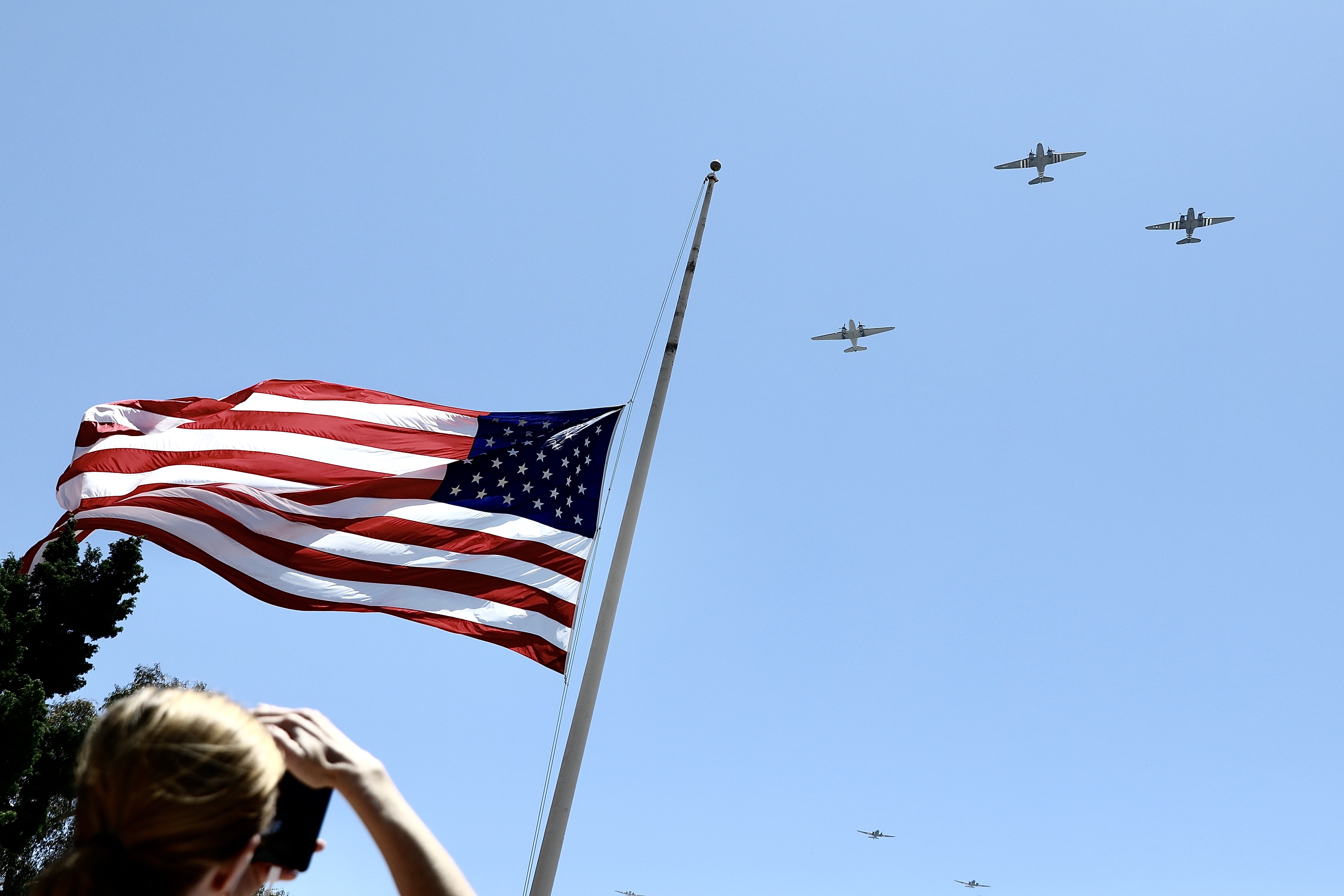 Cover image: World War Two aircraft conduct a flypast over San Francisco National Cemetery (Picture: PA).