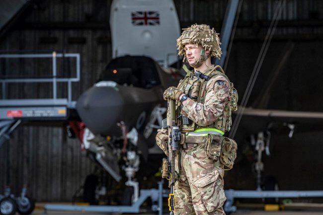 Force Protection personnel guarding an F-35B as part of Exercise Agile Protector at RAF Marham