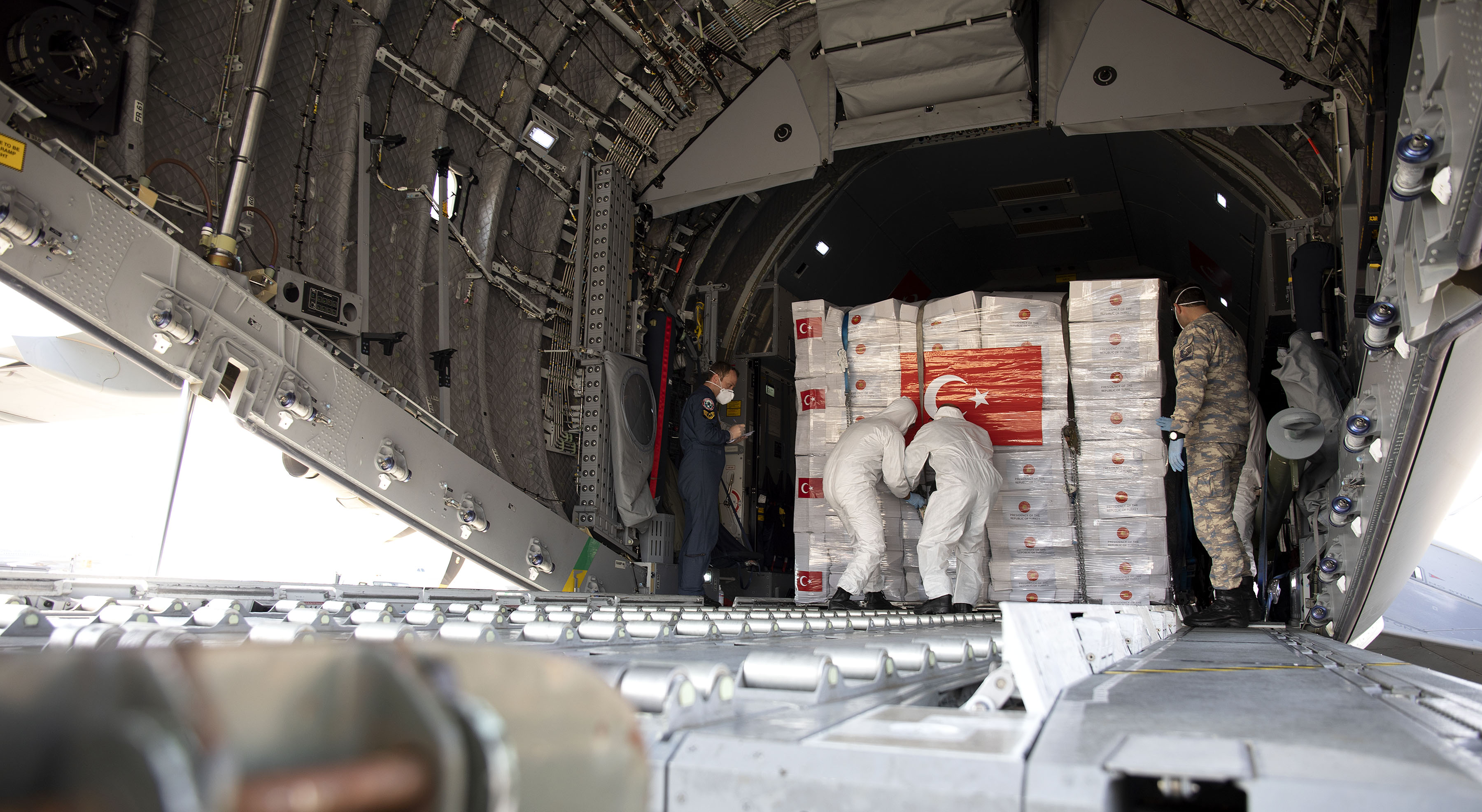 Forces personnel unload PPE for Coronaviurs in UK at RAF Brize Norton 100420 CREDIT MOD.jpg