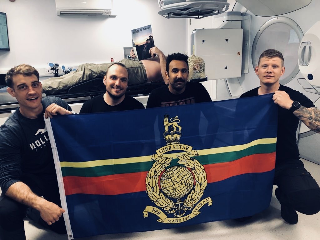 Former Marine Rian Ilettreceiving treatment with support from Royal Marine colleagues