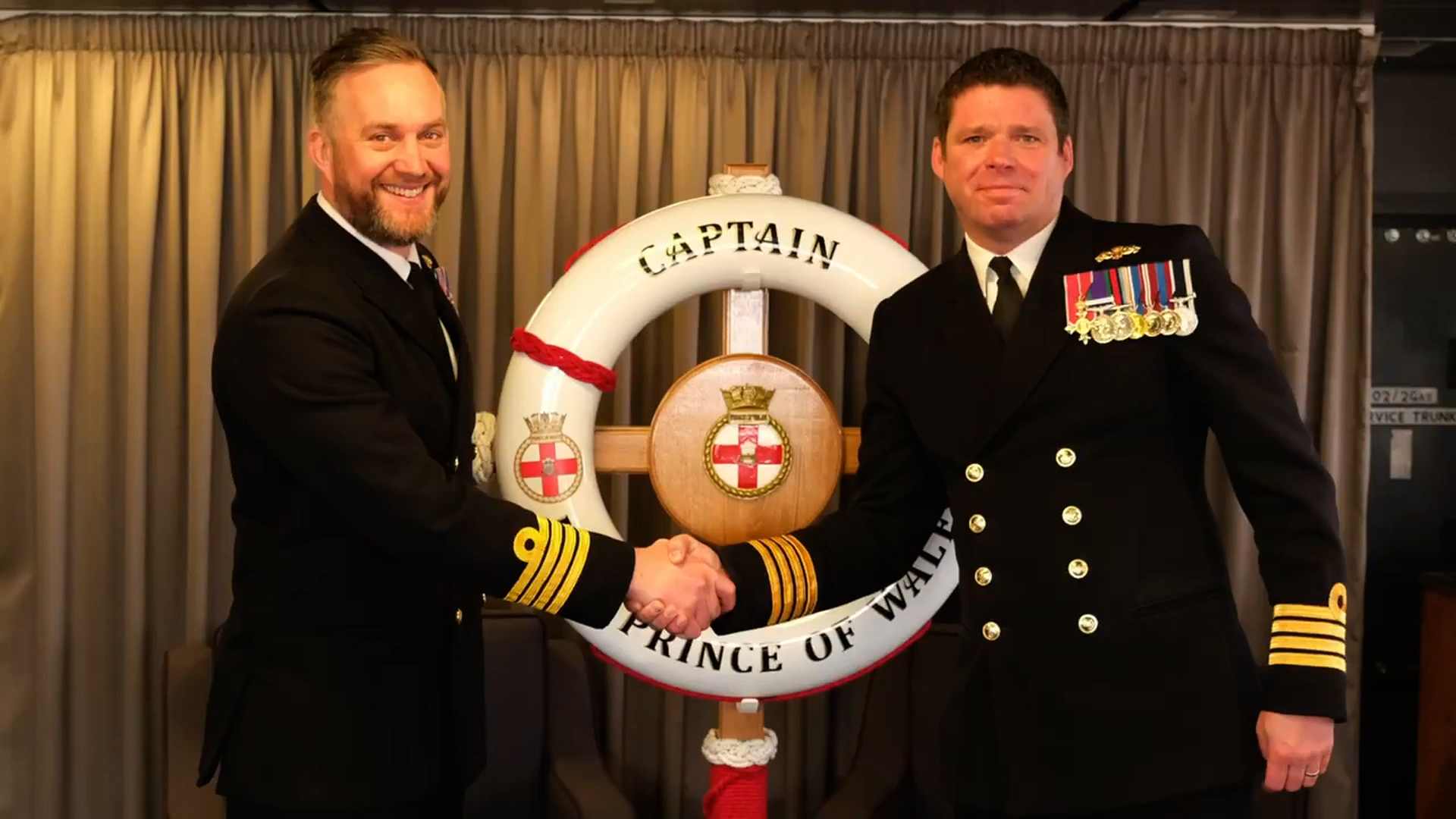 Former PoW Commanding Officer, Captain Hewitt, right hands over command to Captain Will Blackett, left 03012024 CREDIT HMS Prince of Wales