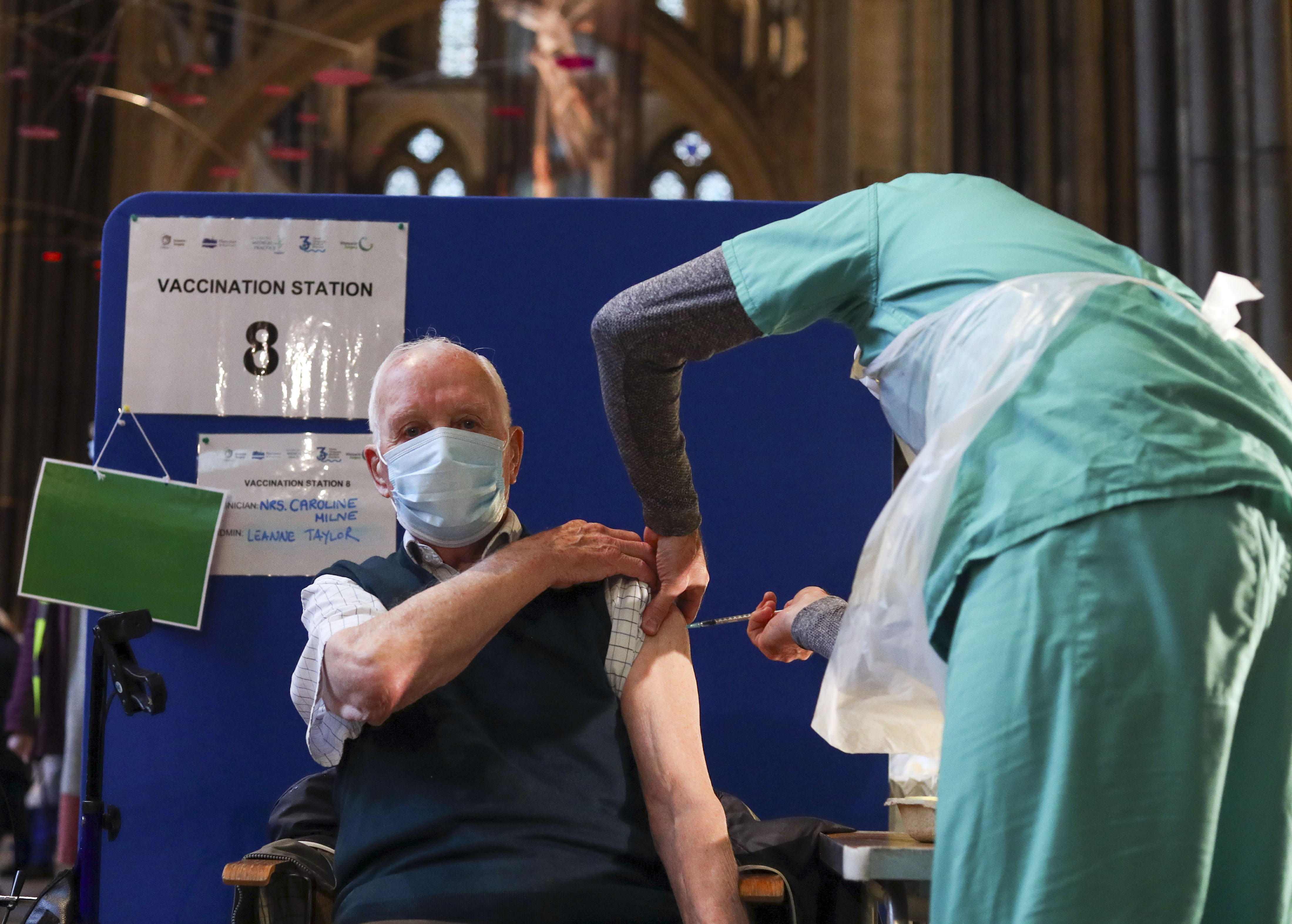 Former RAF Flight Sergeant Louis Godwin receives an injection of the Pfizer coronavirus vaccine at Salisbury Cathedral, Wiltshire. 160121 CREDIT PA .jpg
