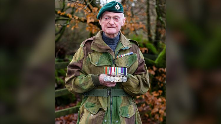 Former Royal Marine Peter White with medals