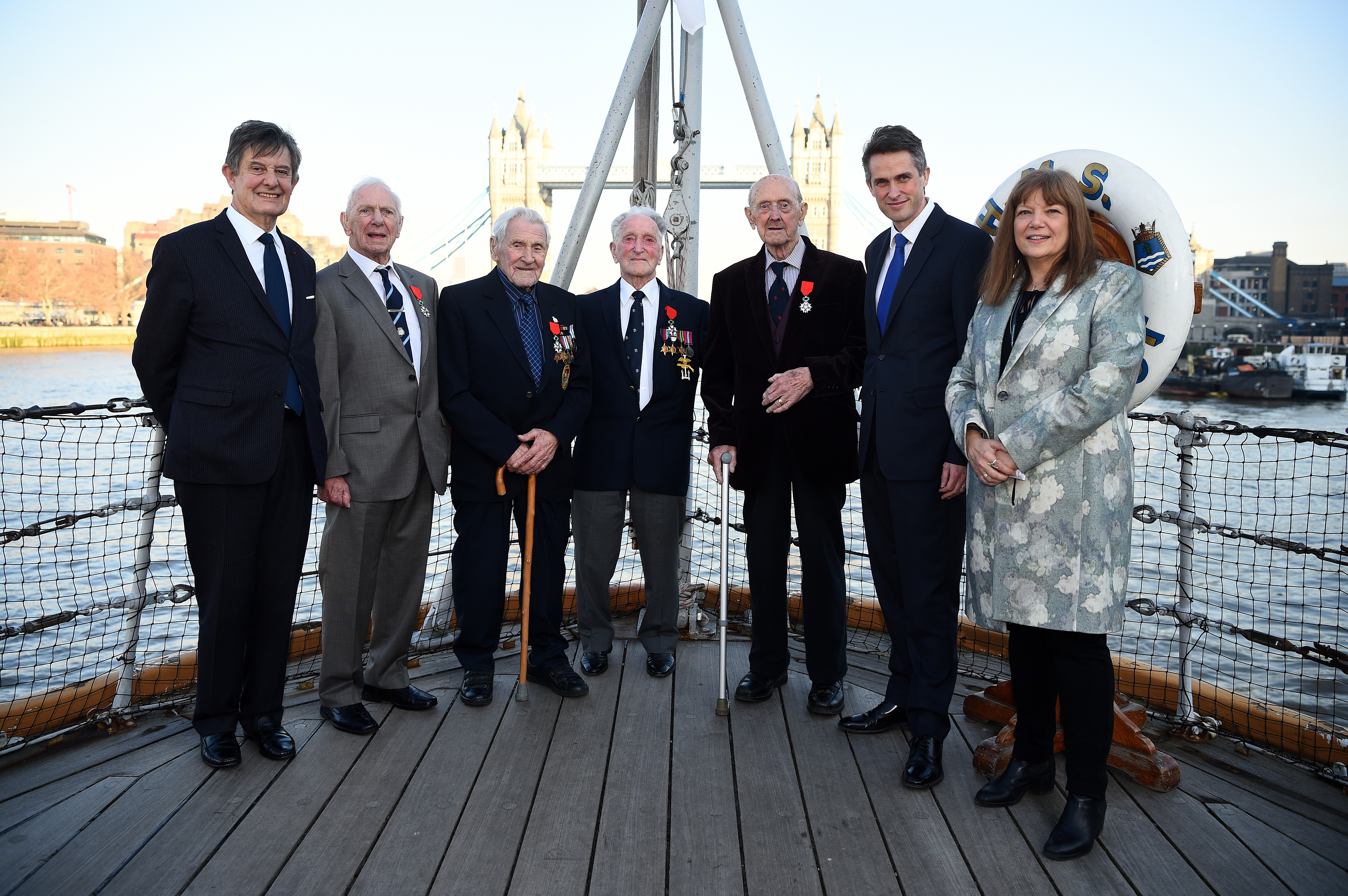 French Ambassador Jean-Pierre Jouyet, Royal Navy veterans Dennis William Haley, John Nicholls, Charles Henry Kavanagh and Patrick Reardon with Gavin Williamson and Director-General of IWM Diane Lees