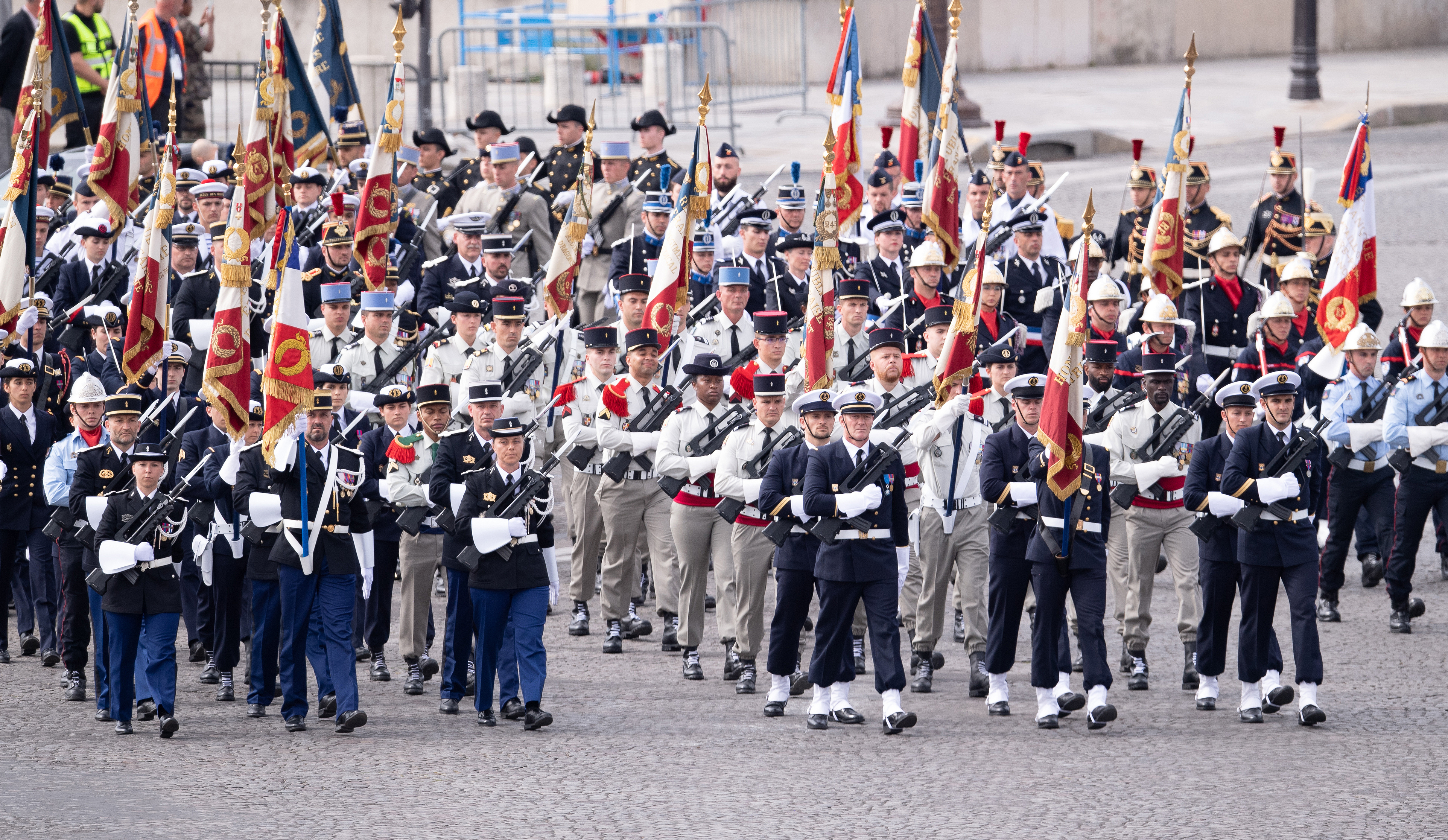 Cover image: A military ceremony was held in the Place de la Concorde as the traditional parade down the Champs Elysees was cancelled (Picture: PA).