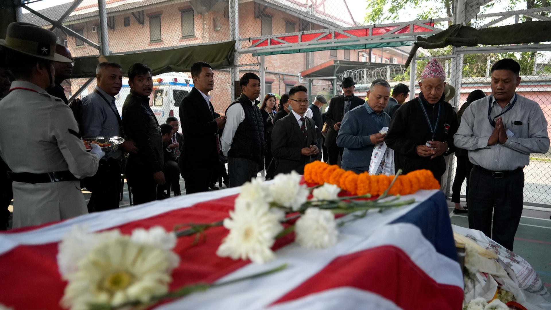 Mourners pay their respects to Captain Limbu