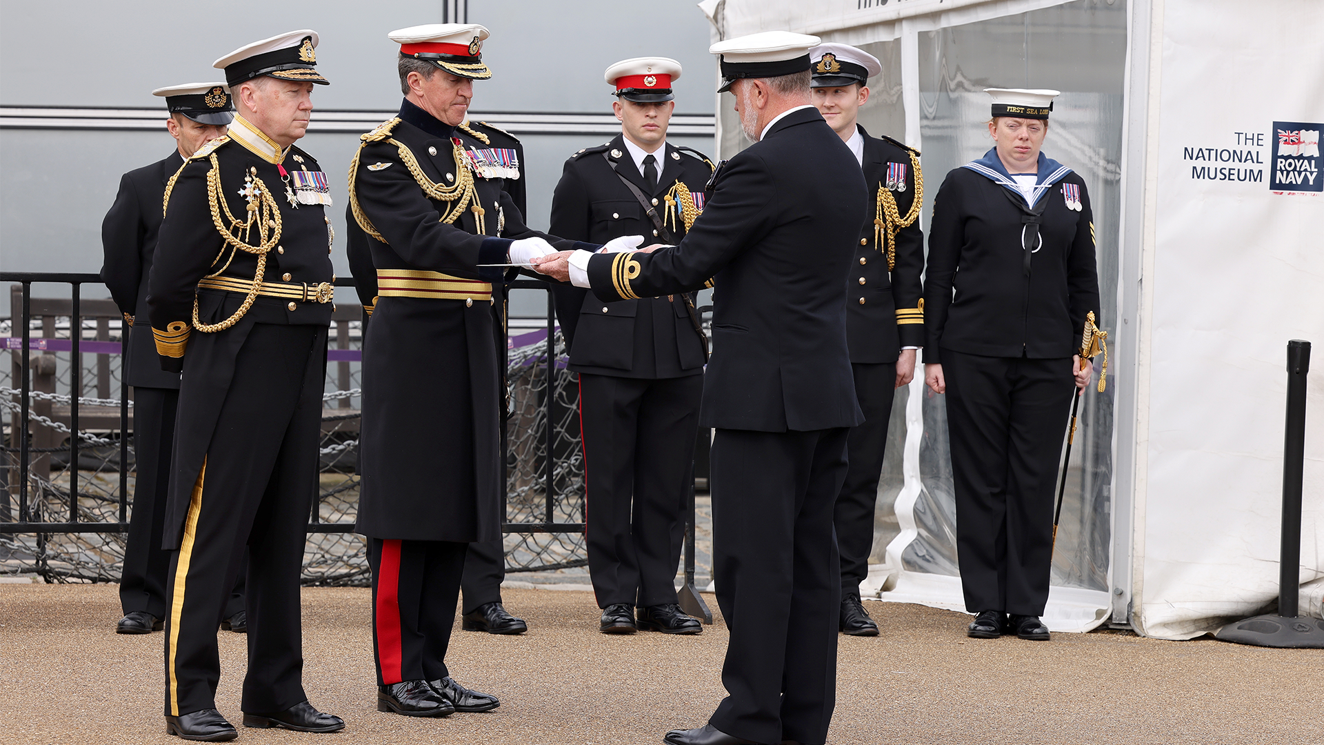 General Sir Gwyn Jenkins receiving his sword that symbolises the First Sea Lord's authority (Picture: Royal Navy)