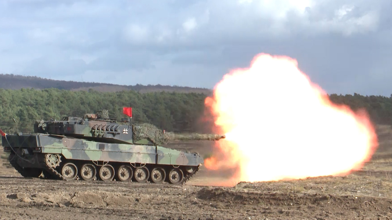 German Leopard 2 tank fires during their largest live firing exercise on Sennelager Ranges in Germany