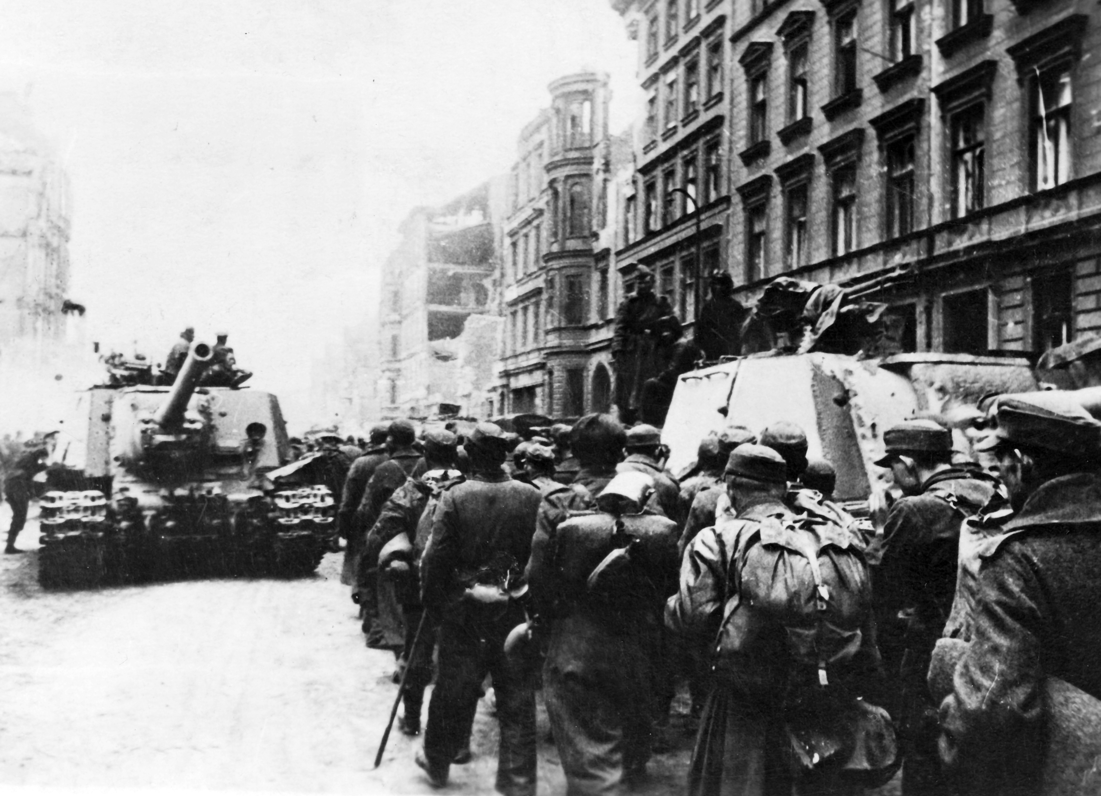 Cover image: German soldiers are captured by Russian forces at the end of the war in Berlin, a week before VE Day (Picture: PA).