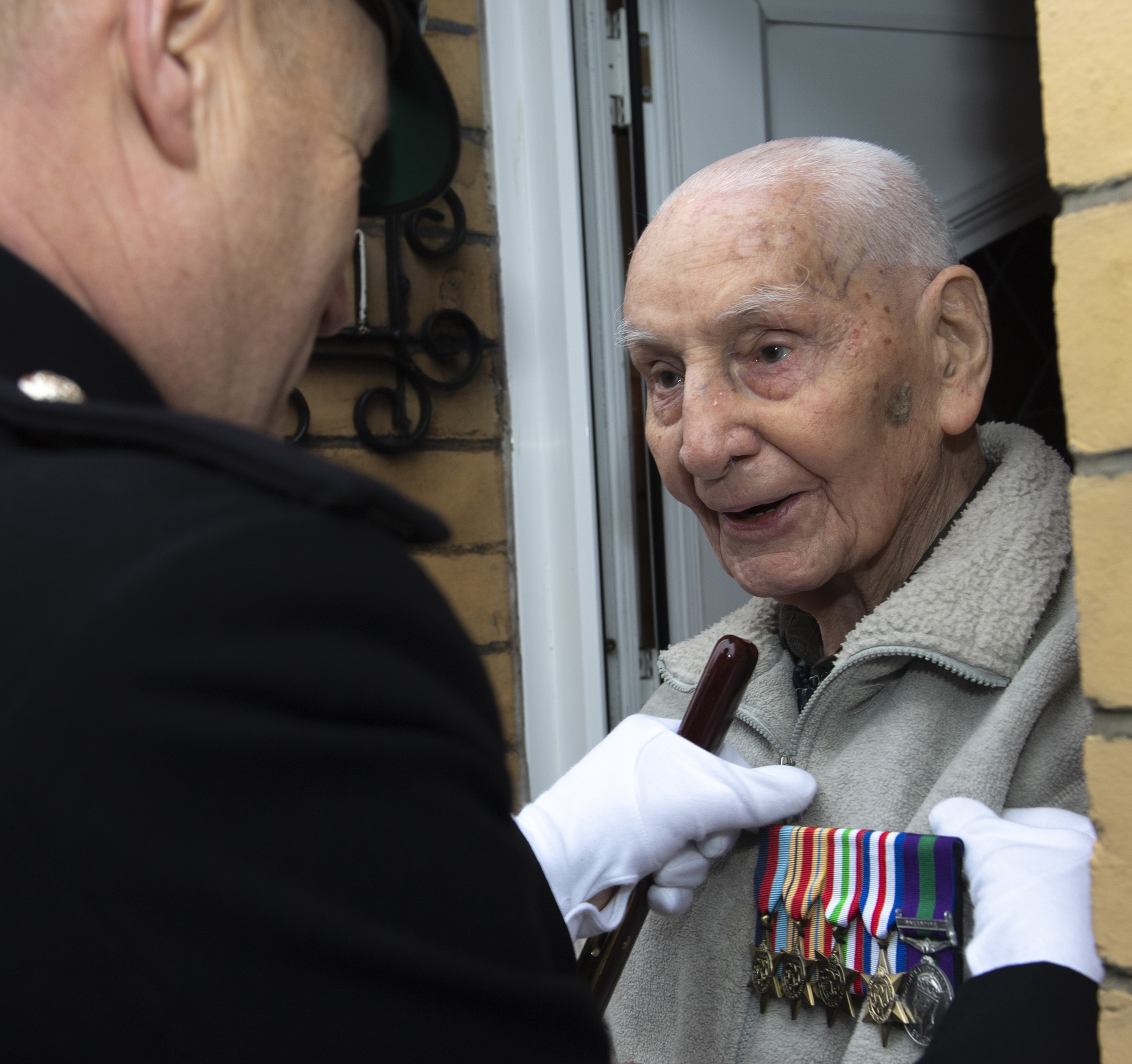 Glyn Gurner presented with medals