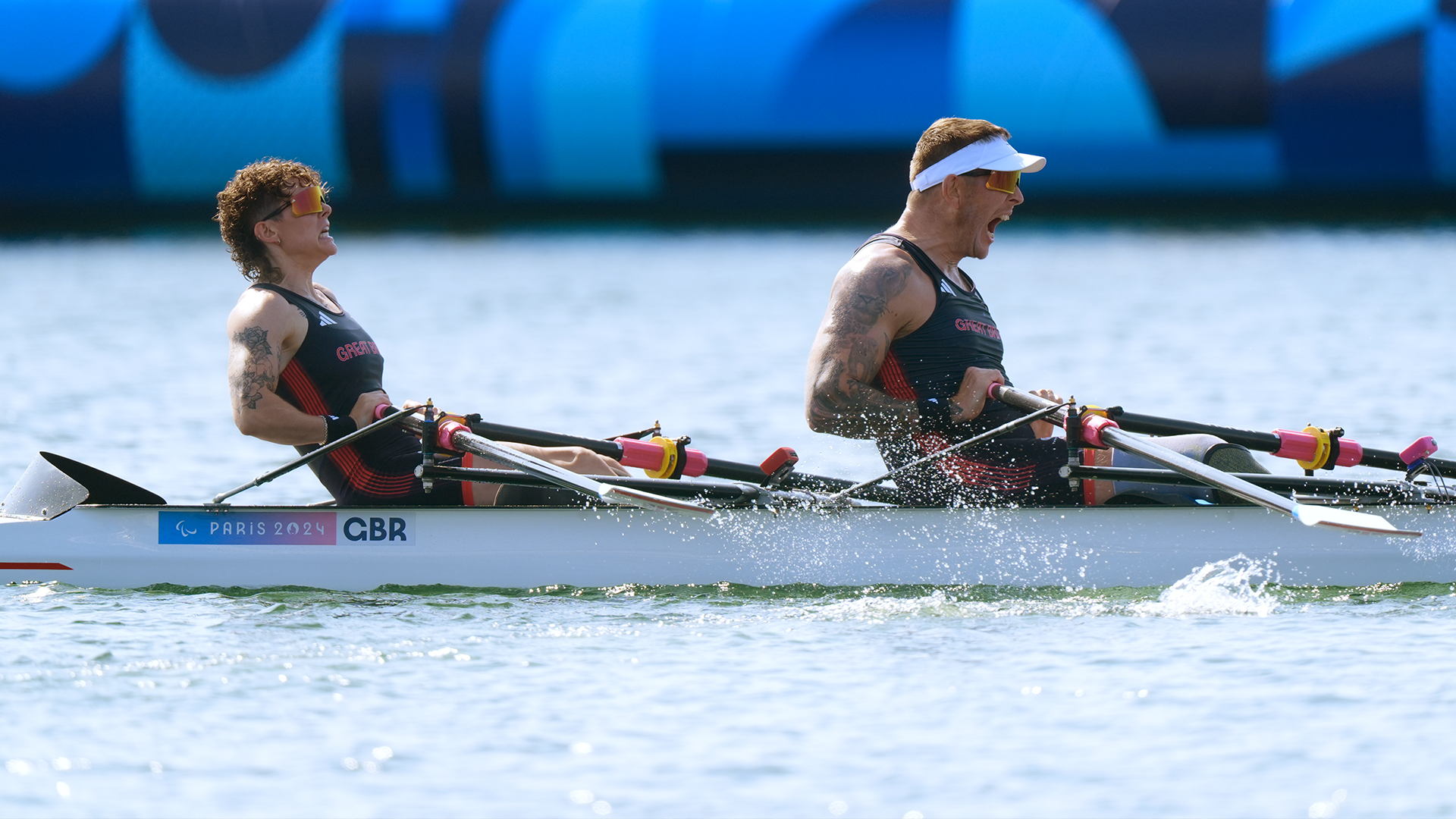Great Britain's Lauren Rowles (left) and Gregg Stevenson celebrate gold in the PR2 Mixed Double Sculls Final A at the Vaires-sur-Marne Stadium on day four of the Paris 2024 Summer Paralympic Games 010924 CREDIT PA
